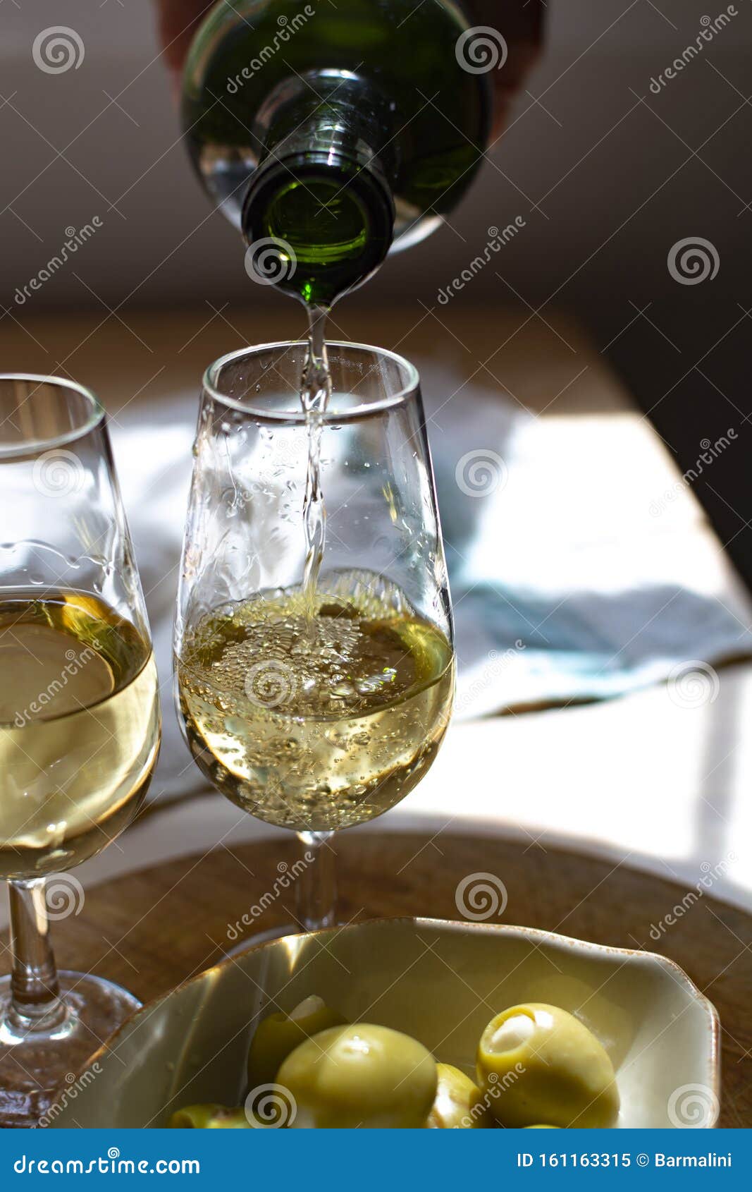 sherry wine tasting, dry fino, manzanilla or palomino jerez fortified wine in glasses, jerez de la frontera, andalusia, spain