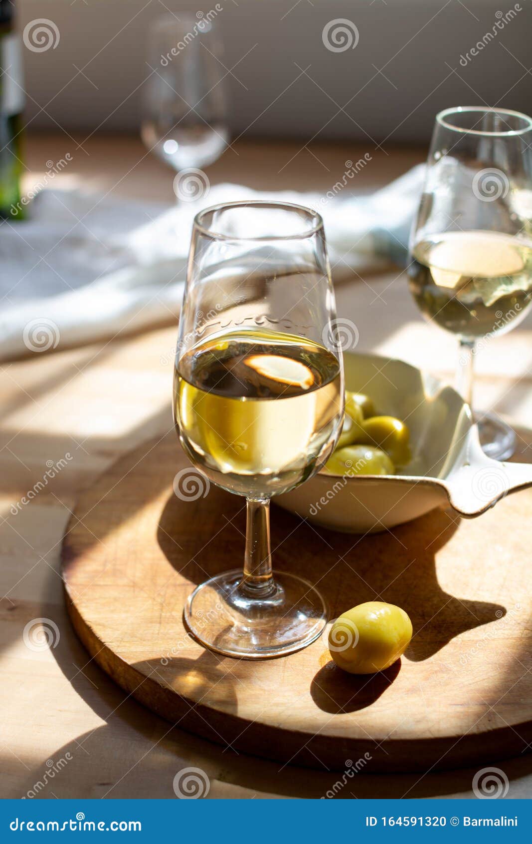 sherry wine tasting, dry fino, manzanilla or palomino jerez fortified wine in glasses, jerez de la frontera, andalusia, spain