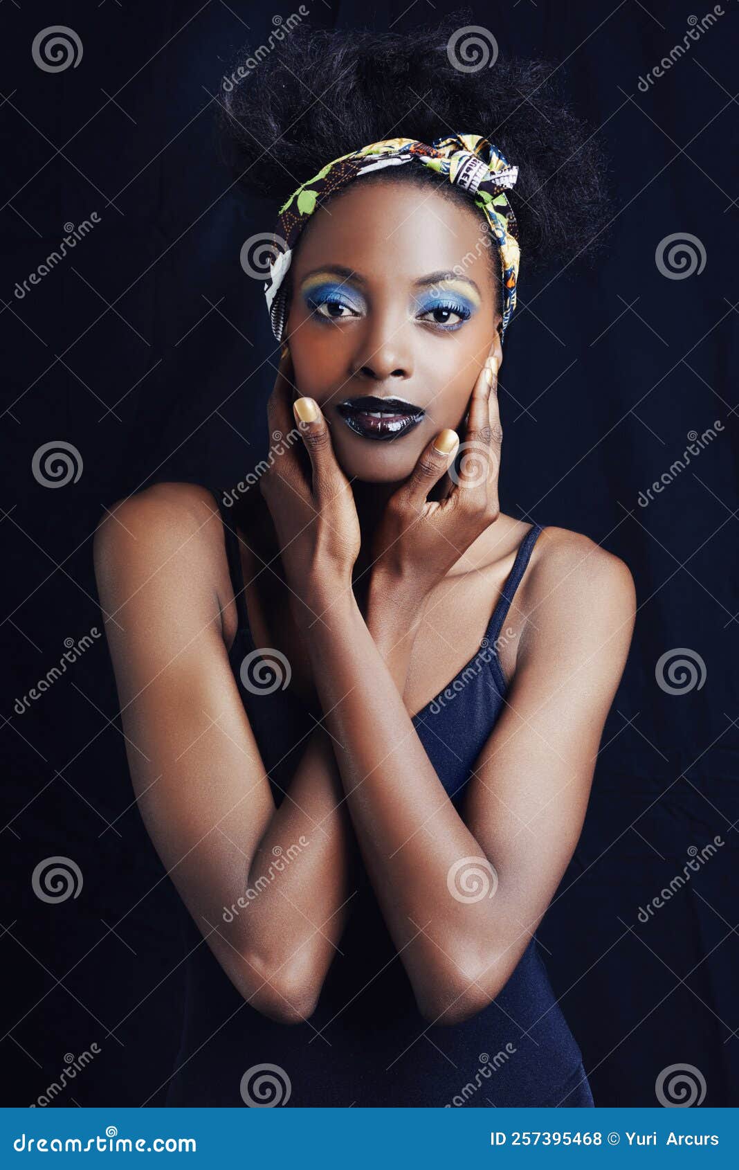 Shes A True African Beauty A Beautiful African Woman Posing Against A Black Background Stock