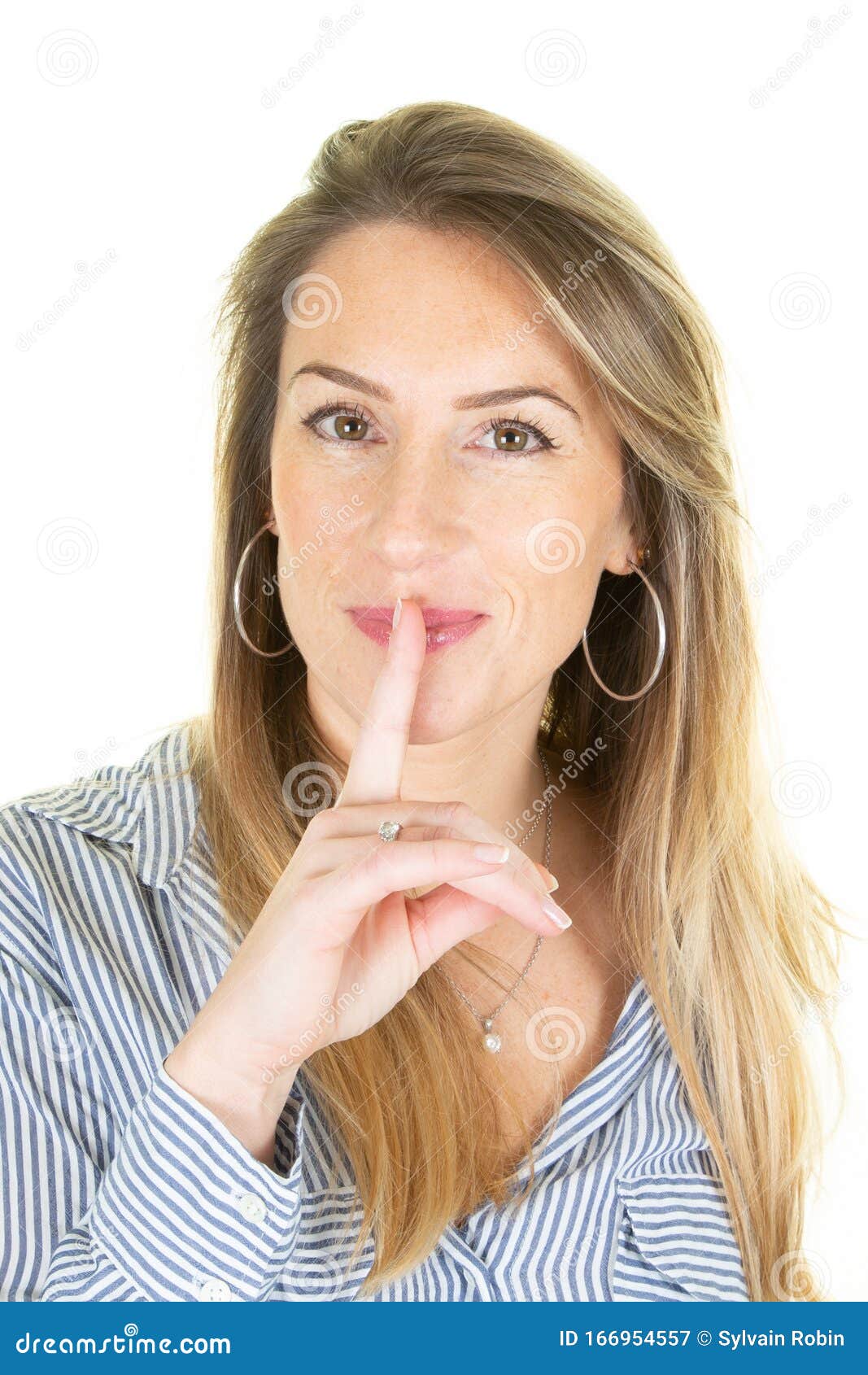 Shh Portrait Of Pretty Sensual Attractive Blond Woman Holding Index Finger On Lips Saying Shush