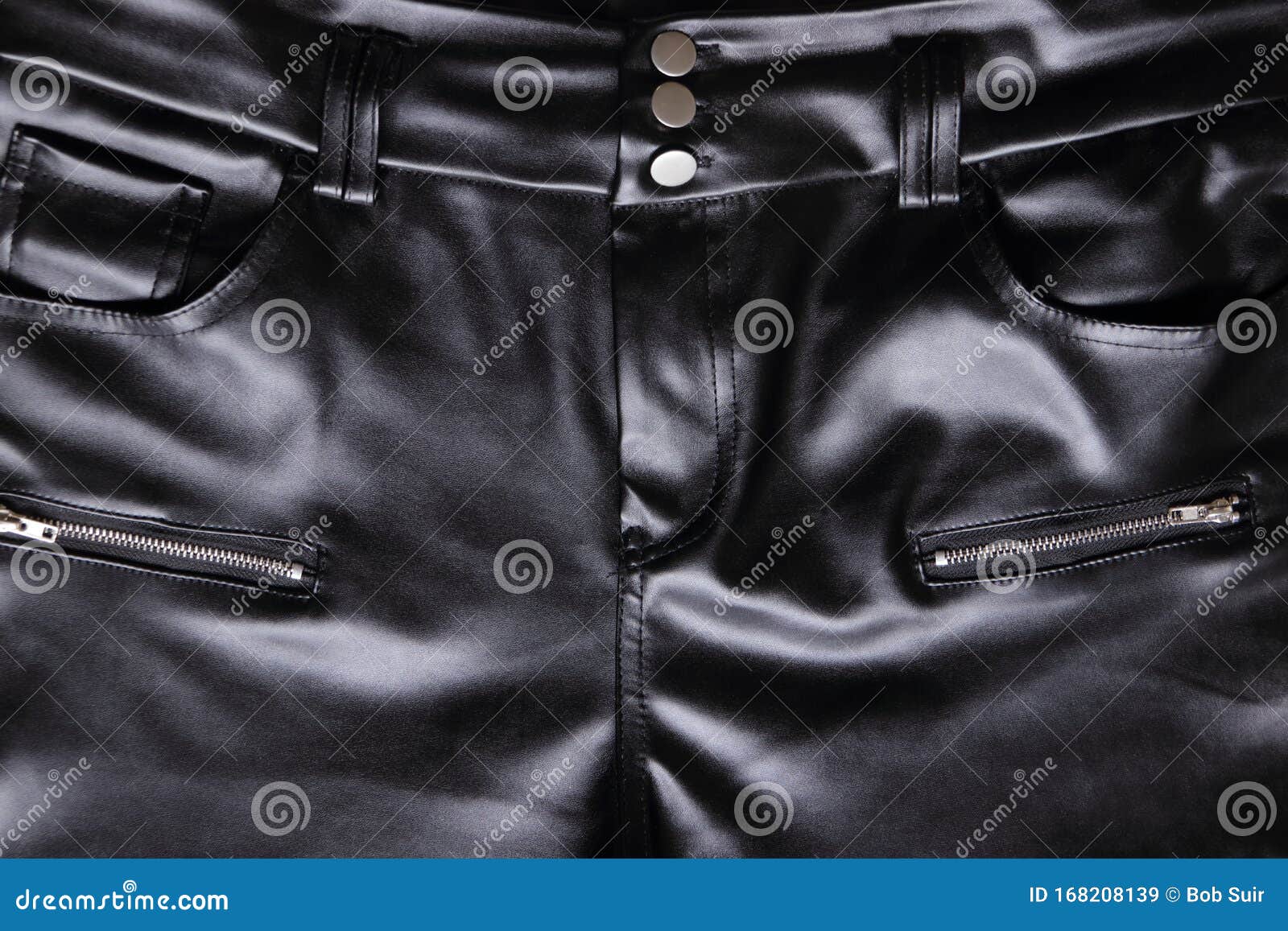 Shiny Black Fake Leather Trousers with Silver Buttons Stock Image