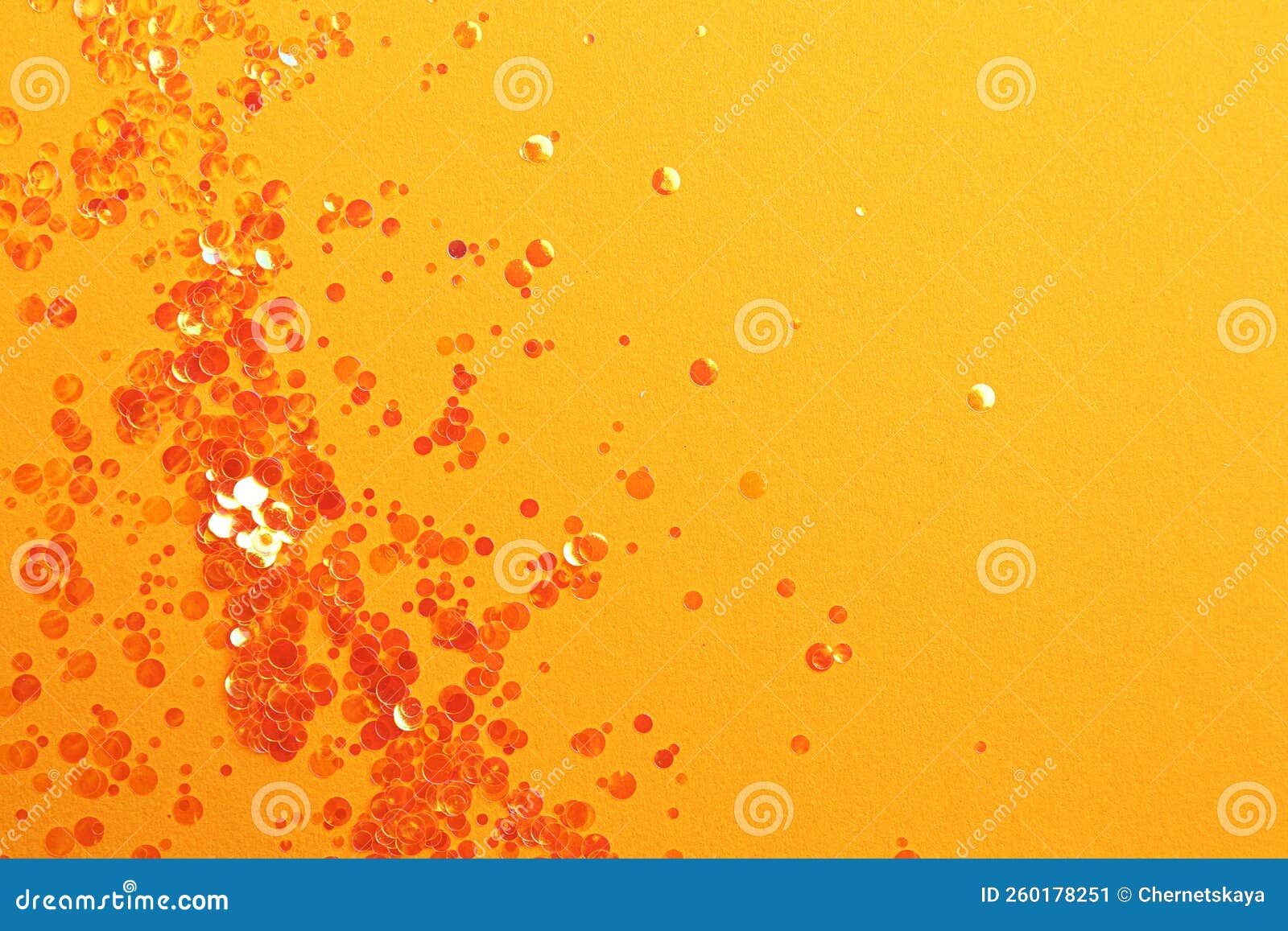 Shiny Bright Glitter on Orange Background, Flat Lay. Space for Text