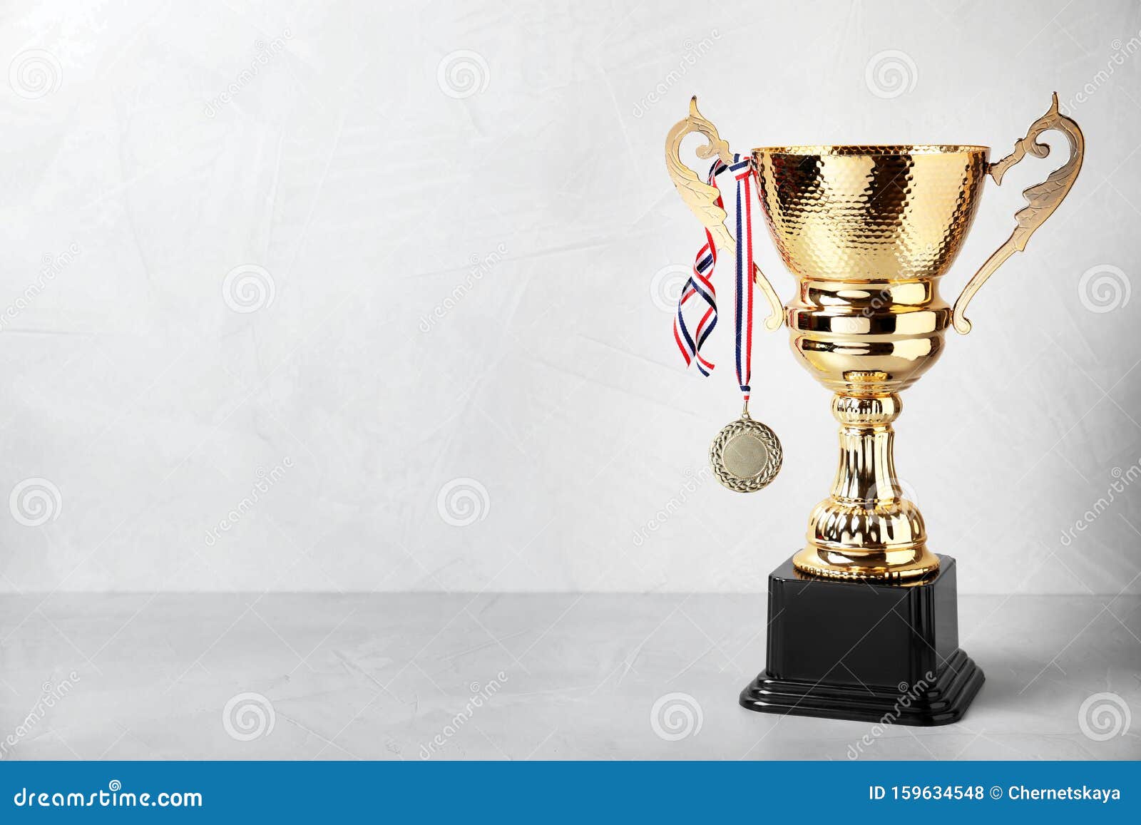 Shiny Golden Trophy Cup and Medal on Background Stock Photo - Image of  perfection, challenge: 159634548