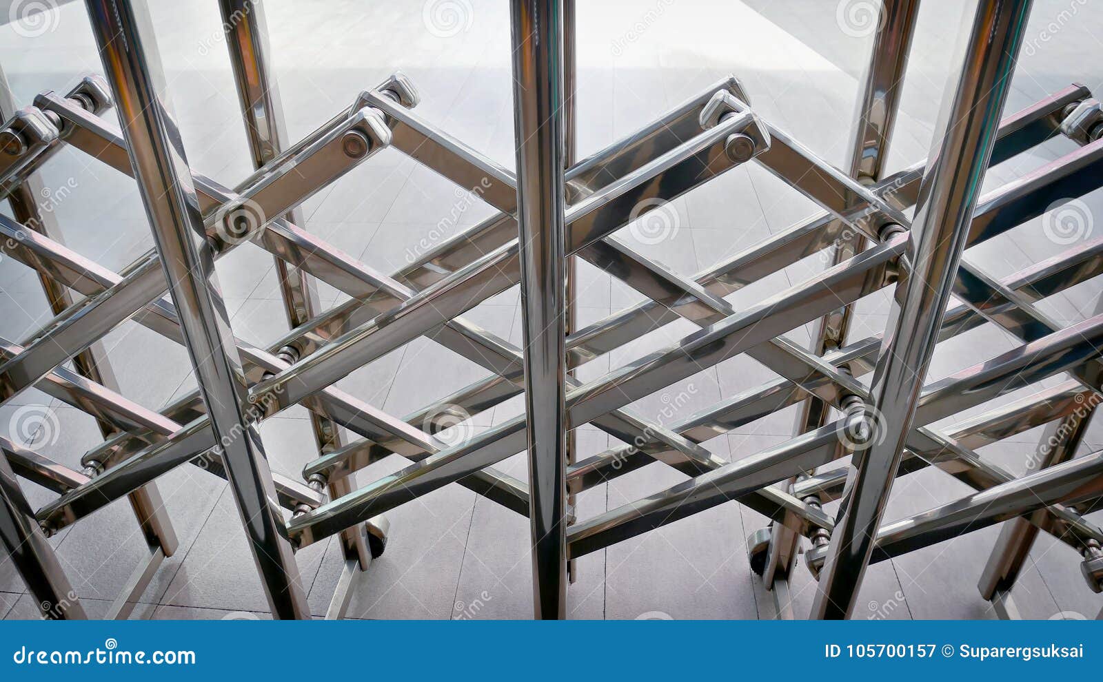 Shiny Stainless Steel Expandable Fence Blocking the Way Stock Image