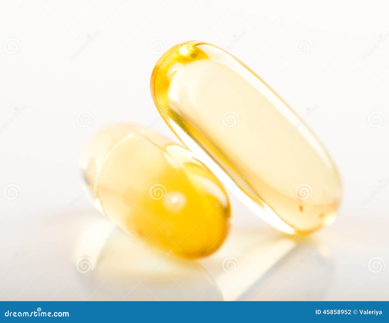 Shiny yellow vitamin e stock photo. Image of gloss, clear 45858952