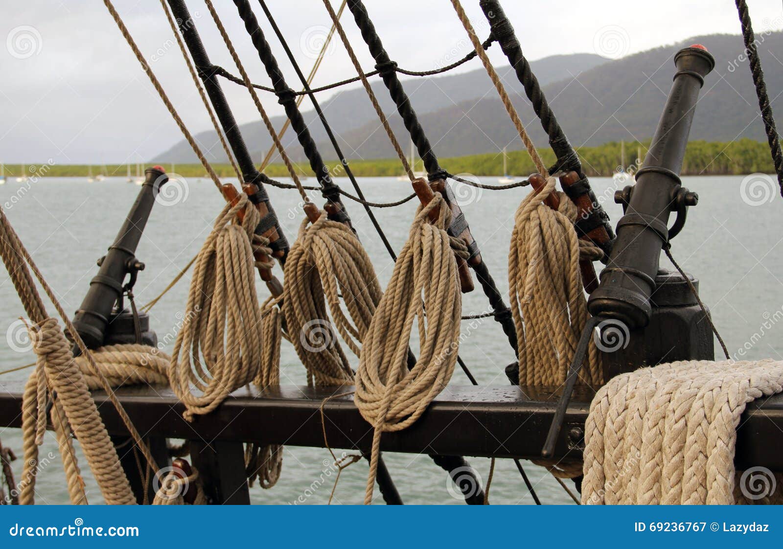 Ship cannons and ropes stock image. Image of ocean, rigging 69236767