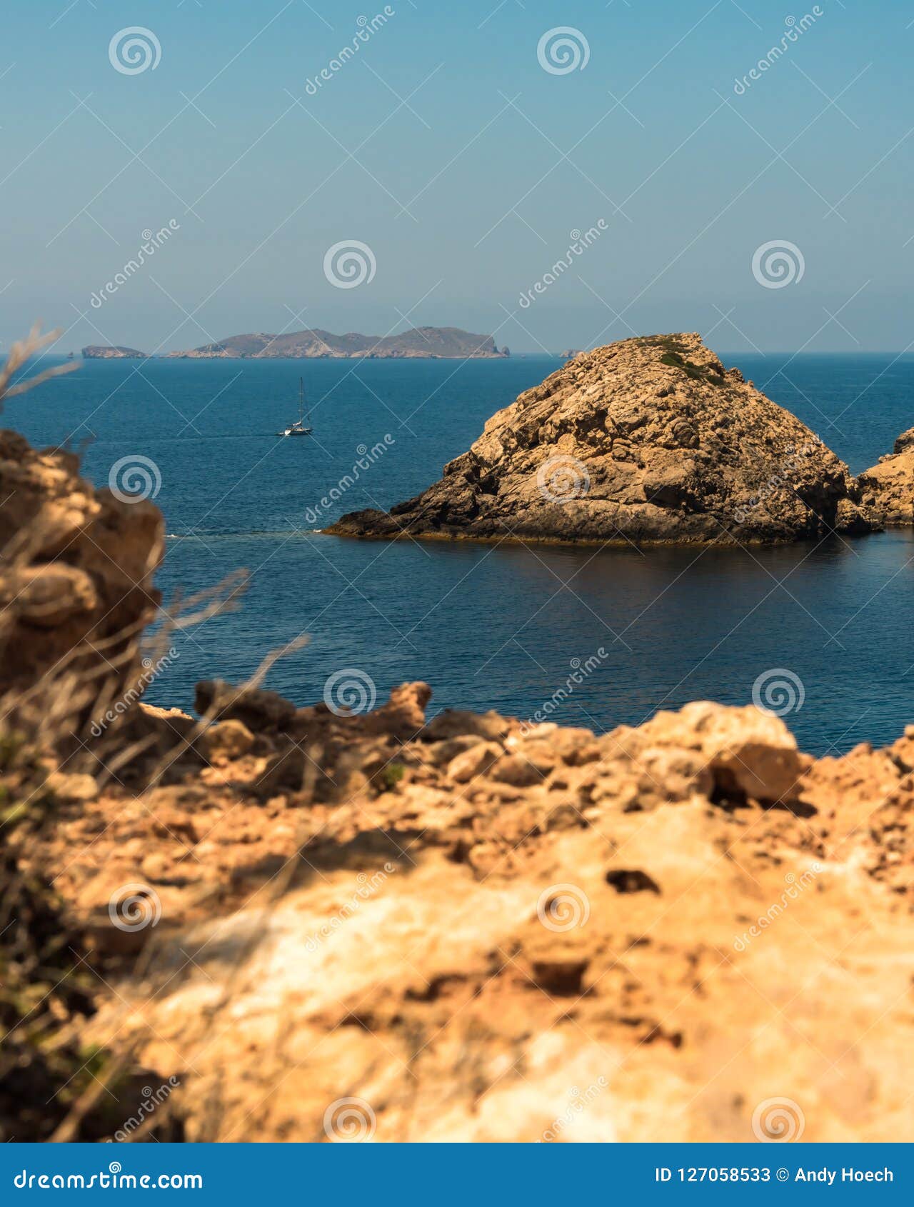 A Ship Sails between the Rocks in the Bay Near Ibiza Stock Image ...