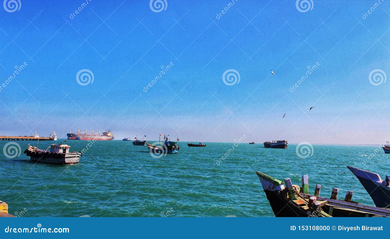 Ships Sailing In The Blue Ocean Stock Photo Image of