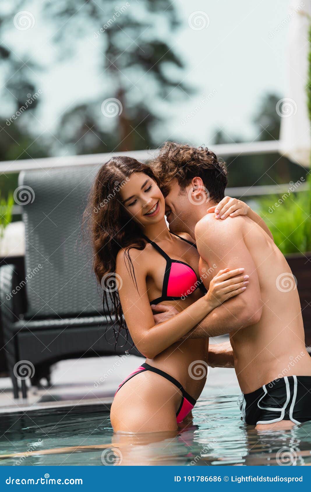 Lesbians Making Out In Pool