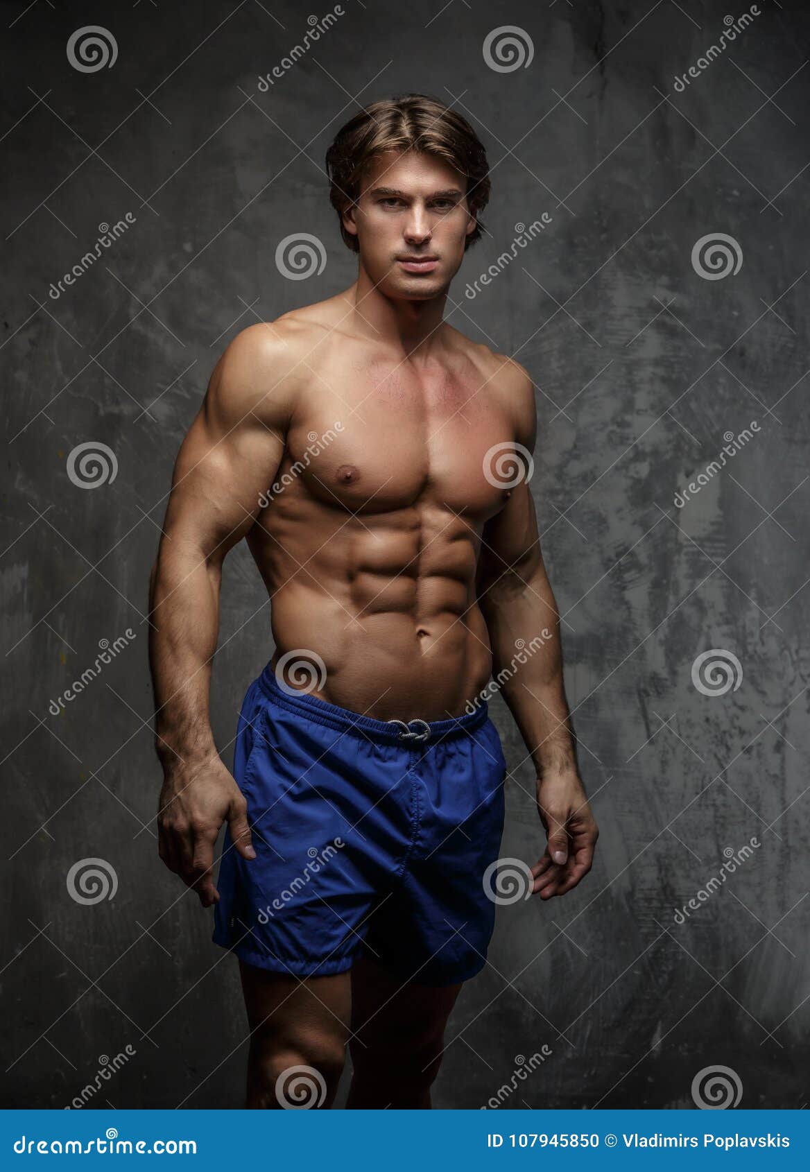 Awesome Shirtless Bodybuilder In Blue Shorts. Royalty-Free Stock ...