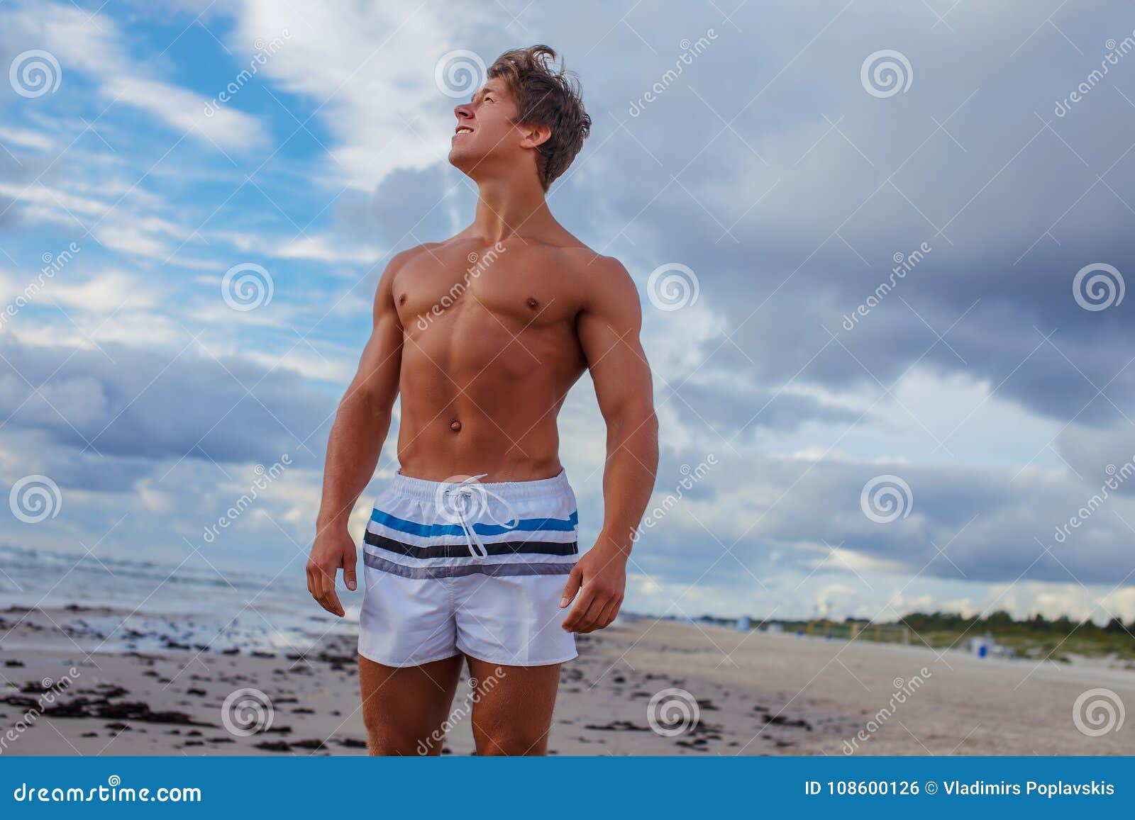 Shirtless Muscular Man in Swimming Shorts. Stock Photo - Image of beach ...