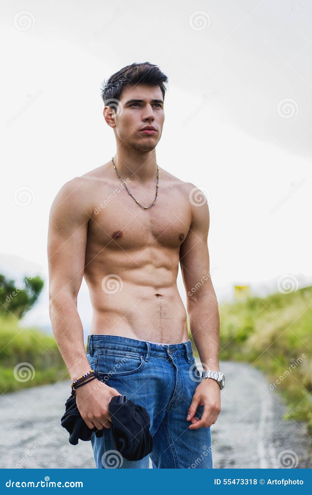 Shirtless Muscular Young Man Walking On Rural Road Stock Photo - Image