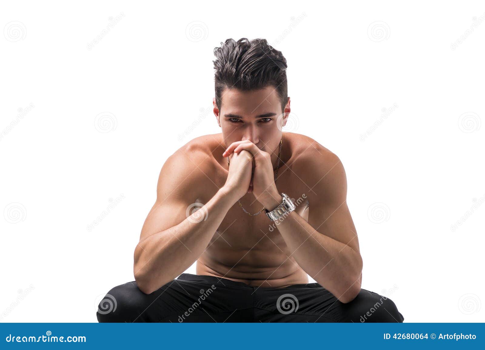 shirtless young man deep in contemplation