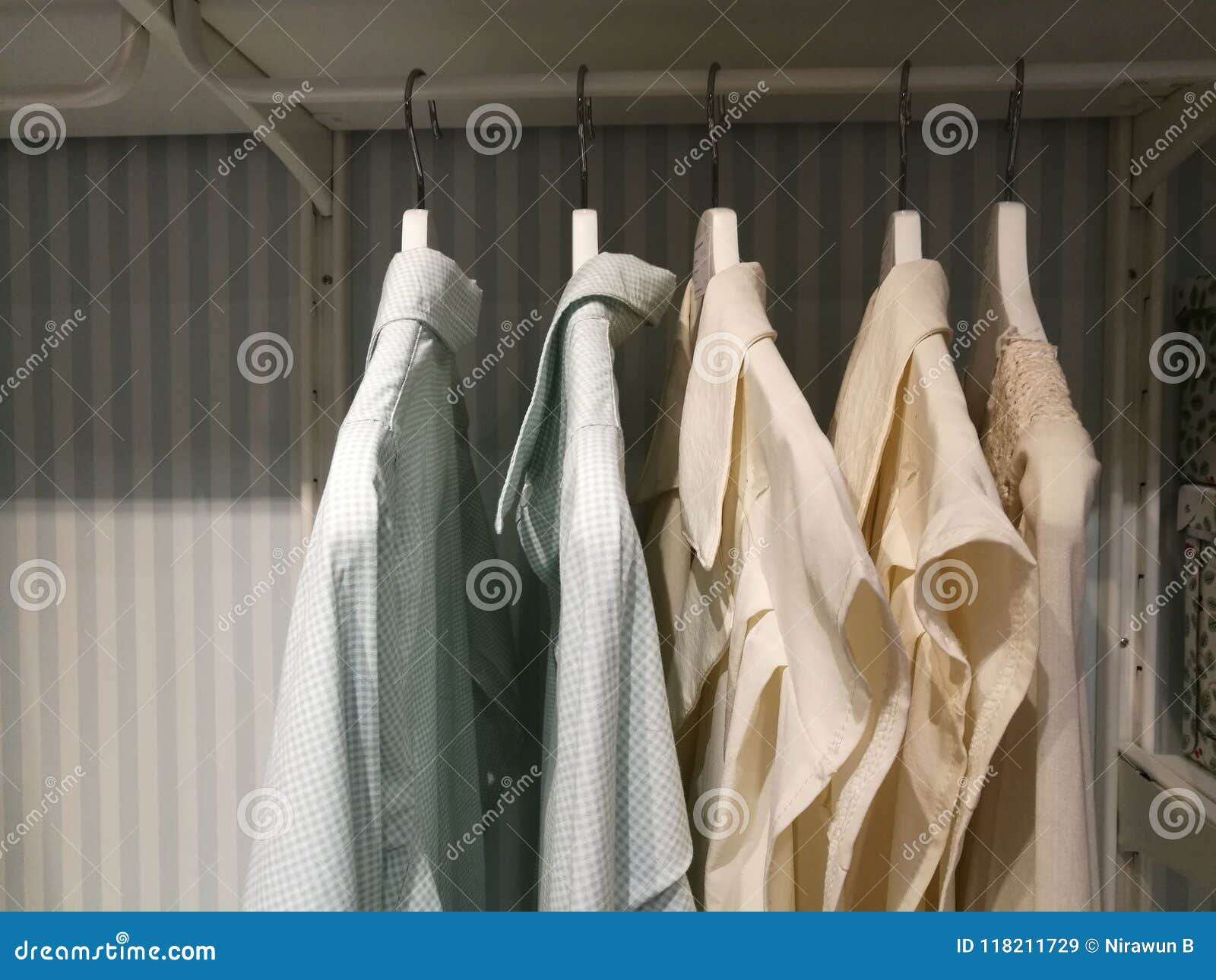 Shirts Hanging on Rack Hang Line in Built-in Cupboard.a Row of Colorful ...