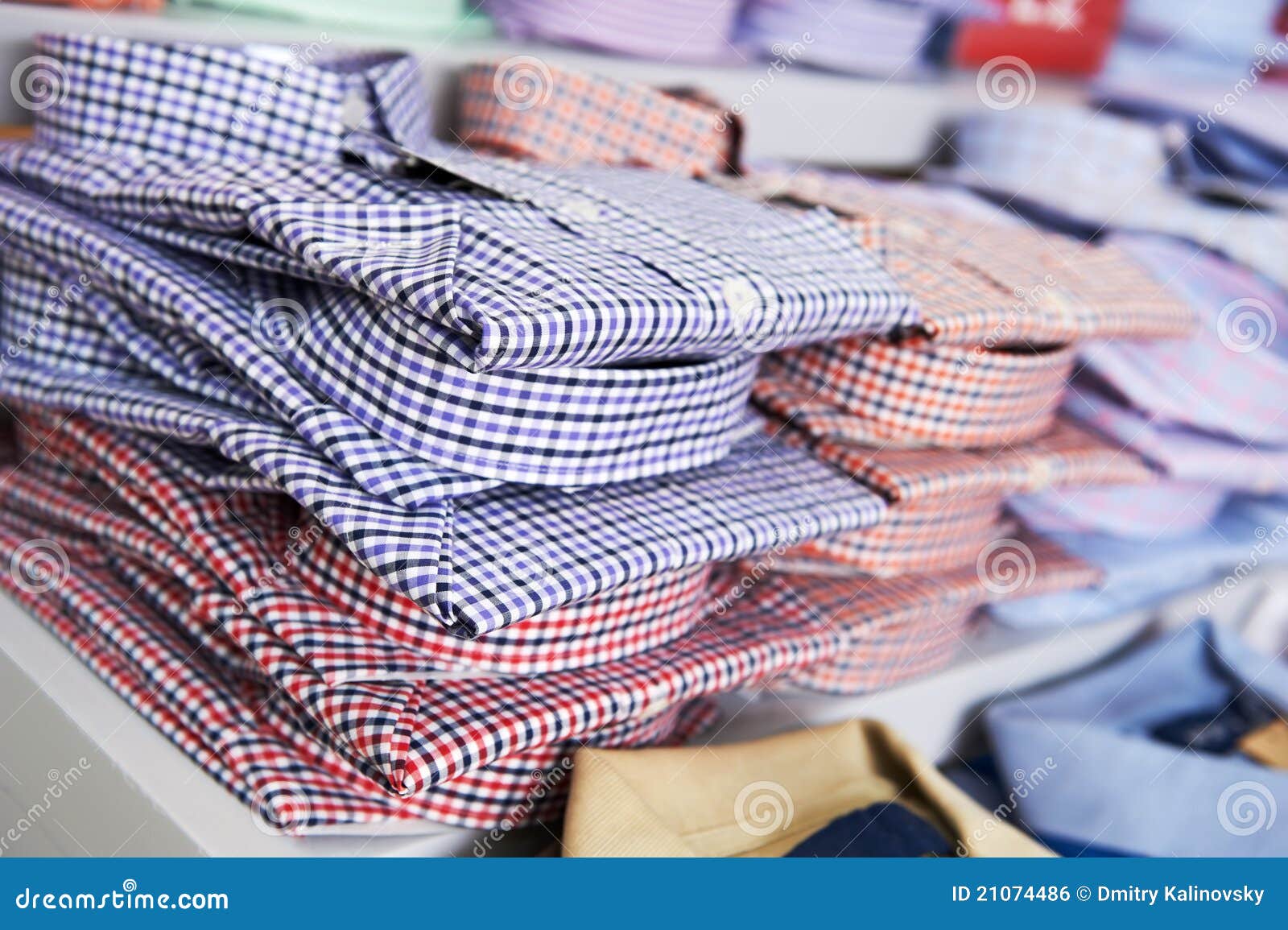 Shirts in a shop stock photo. Image of display, textile 21074486