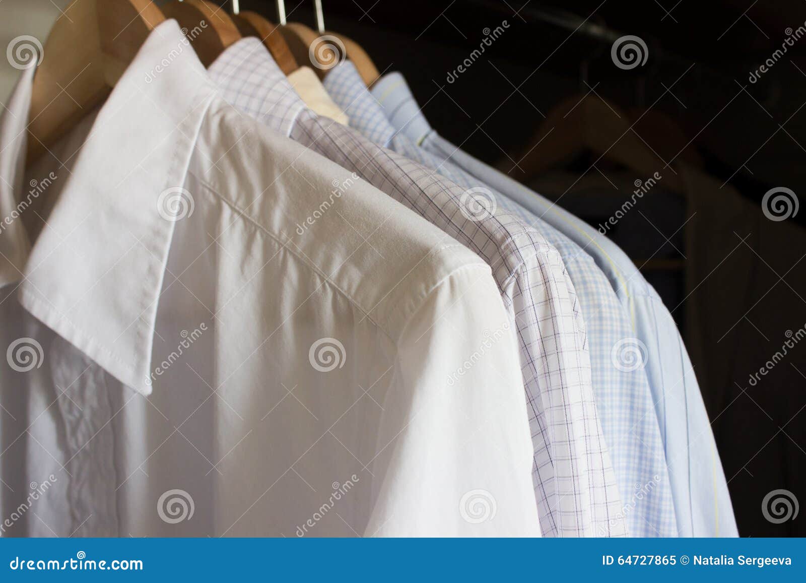 Shirts in a wardrobe stock image. Image of attire, wear - 64727865