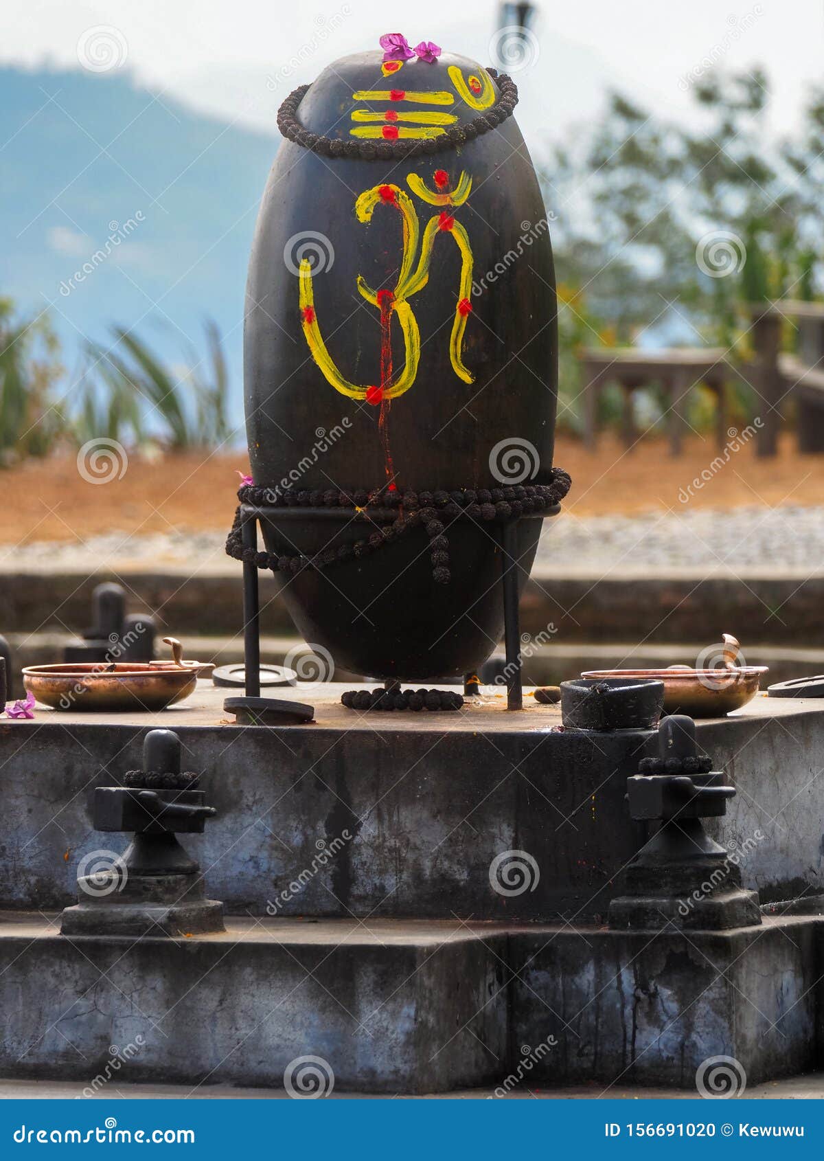shiva lingam, shiva lingas with om  painted on, wrapped with rudraksha in dhulikhel, nepal
