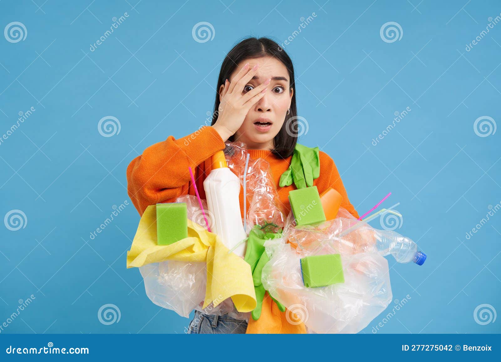 Shocked Asian Woman, Looks Embarrassed at Something Horrible, Holding ...