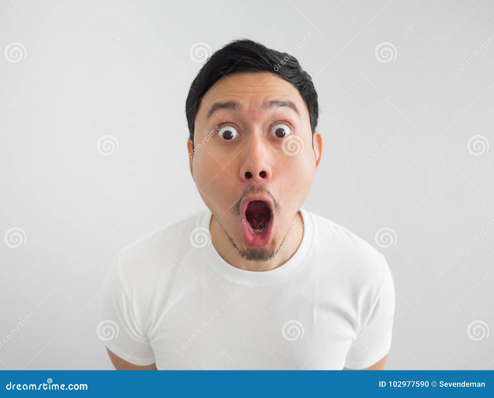 [Image: shocked-face-asian-man-white-shirt-grey-...977590.jpg]