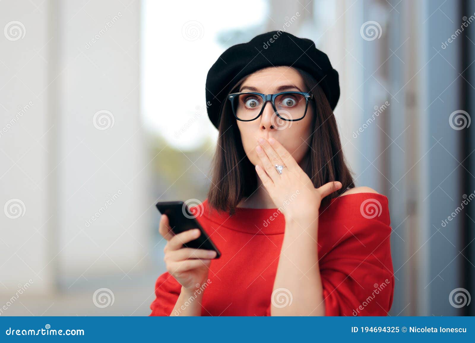 surprised fashion woman reading a text message