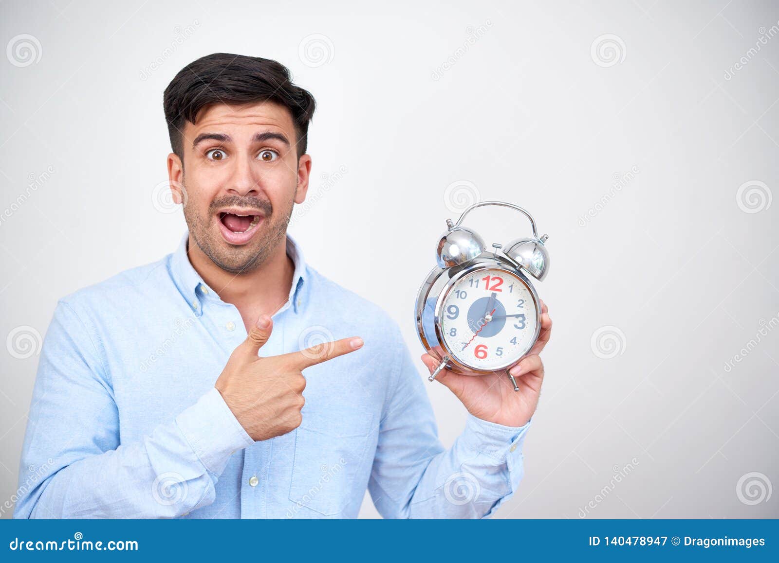 Shocked Man with Alarm Clock Stock Image Image of background, white