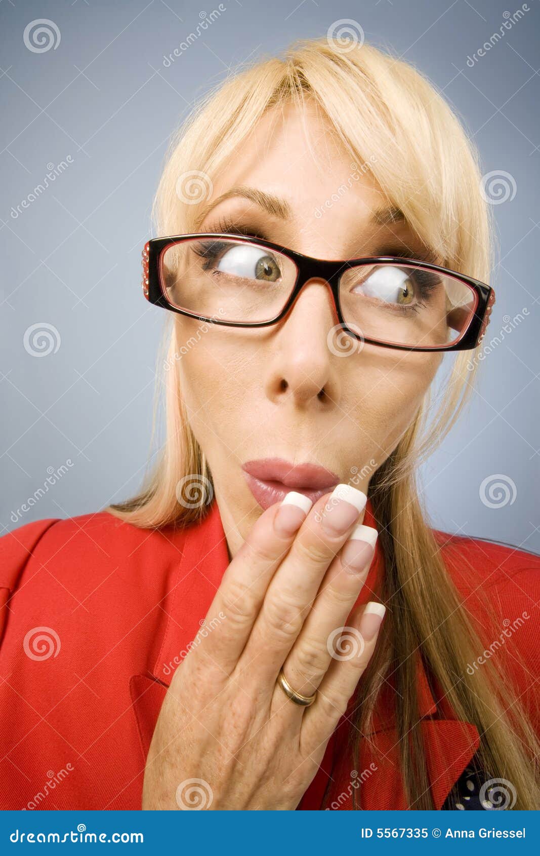 Shocked Woman In Red Making A Funny Face Royalty Free Stock Photo