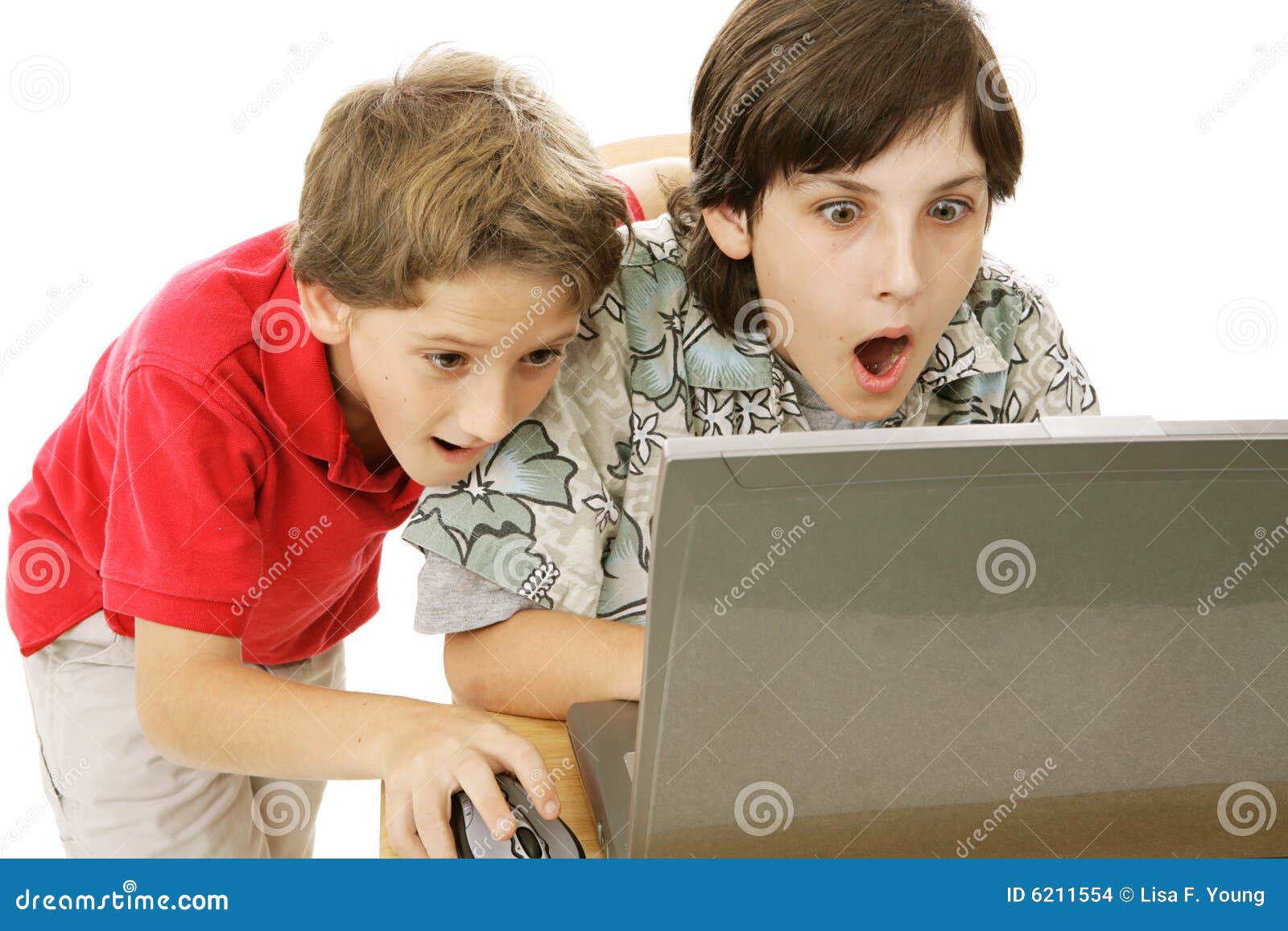 Shocking Internet Content. Two brothers shocked by what they are seeing on the internet. Isolated on white.