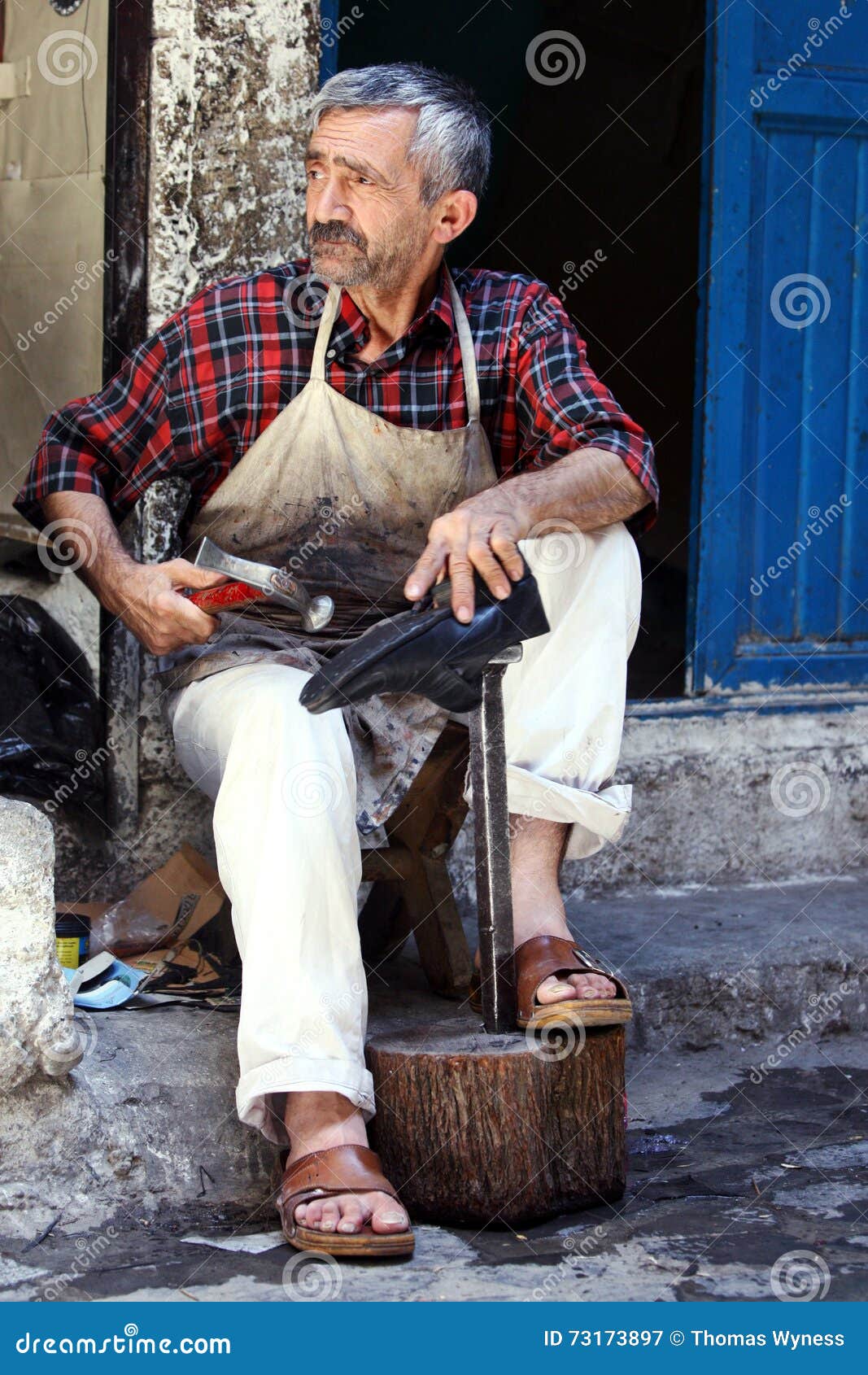A Shoe Cobbler in Urfa Bazaar in Turkey. Editorial Photography - Image ...