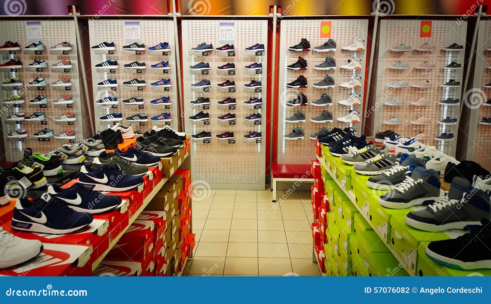 Shoe Shop. Shelves with Many Sneakers. Editorial Photography - Image of ...
