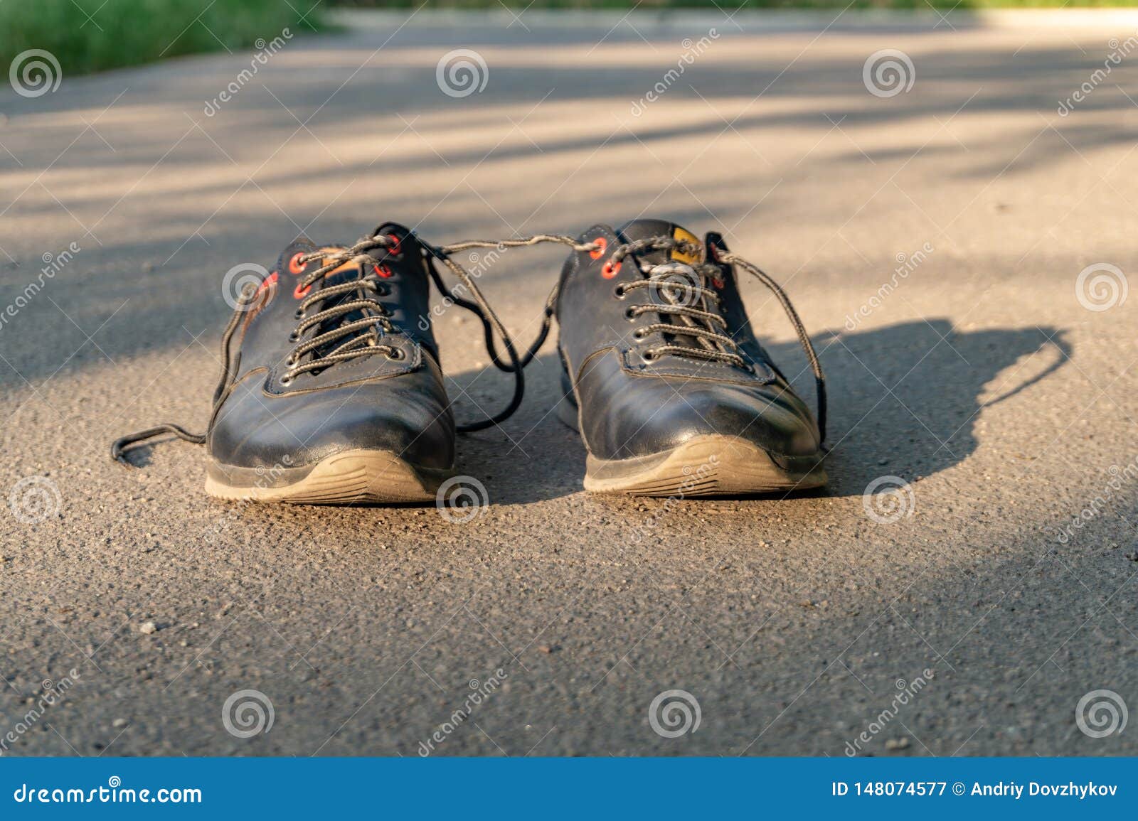 Shoes on Asphalt Stand Alone Waiting for the Owner To Play Sports on ...