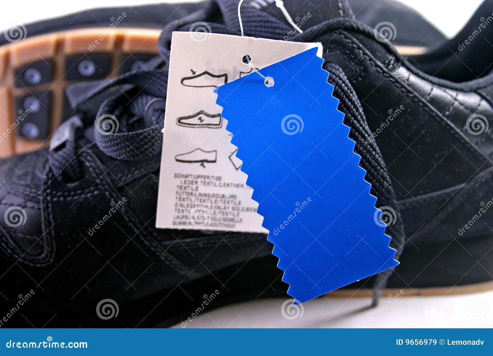 Shoes with blue tag stock image. Image of exercise, close 9656979