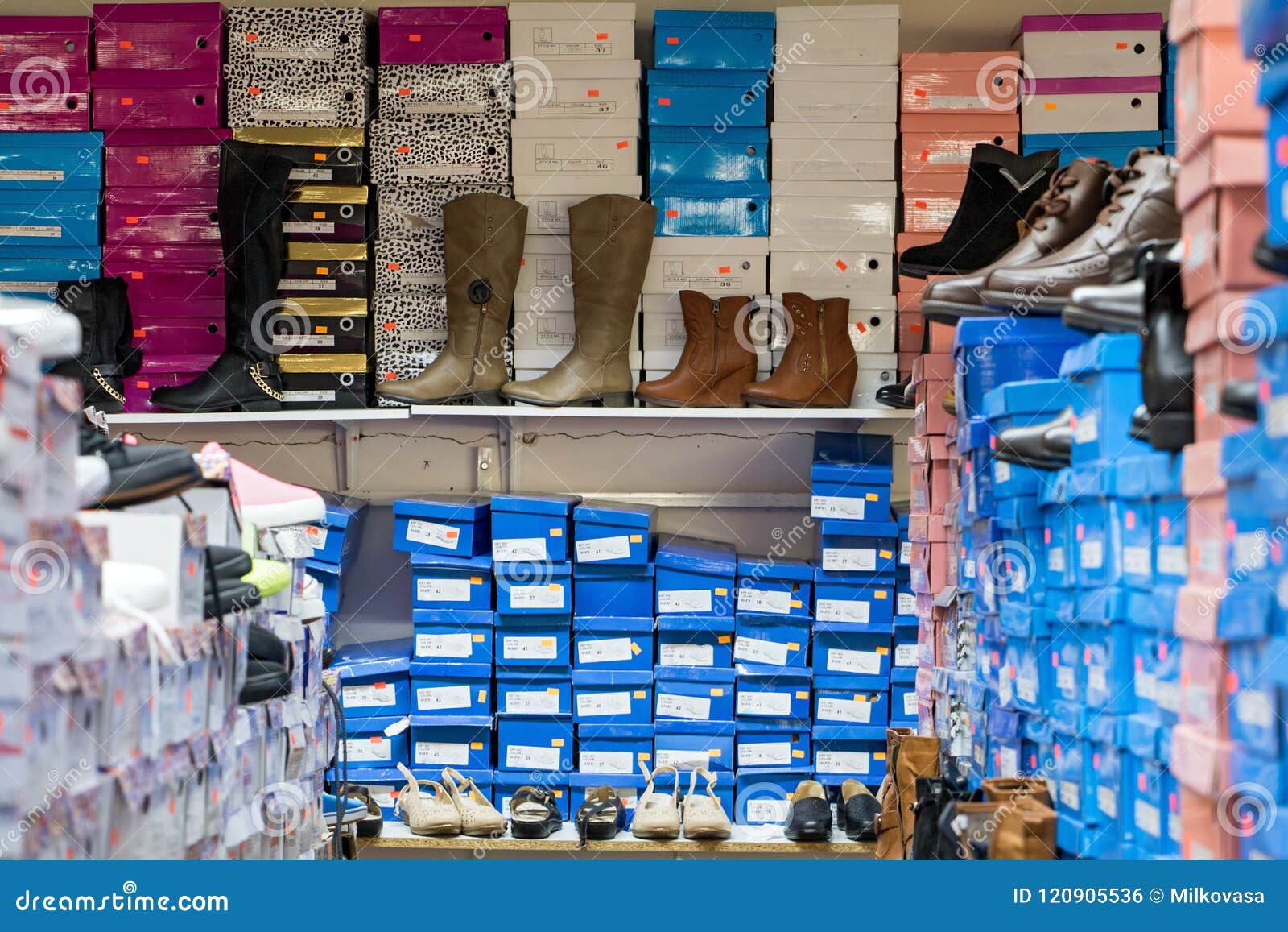 Shoes with Boxes on the Shelves in the Shop Stock Photo - Image of line ...