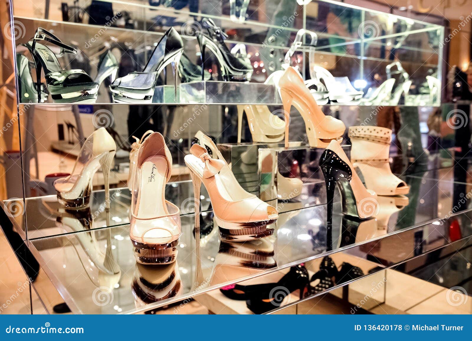 Shoes and Handbags in an Up-Market Fashion Clothing Retail Store ...