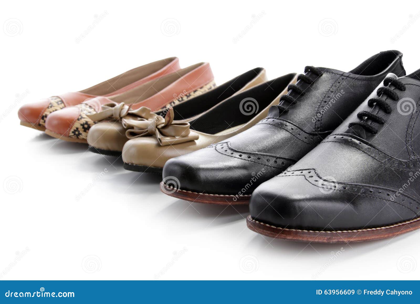 Shoes in a row on white stock image. Image of background - 63956609