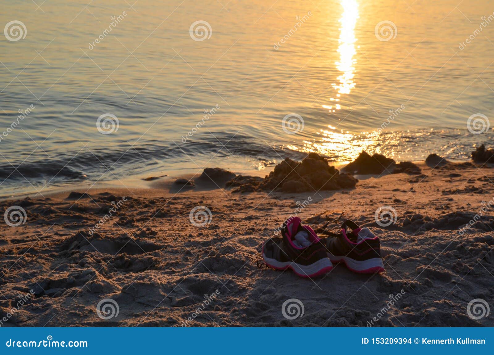 Shoes by Seaside on a Sandy Beach Stock Photo Image of seashore