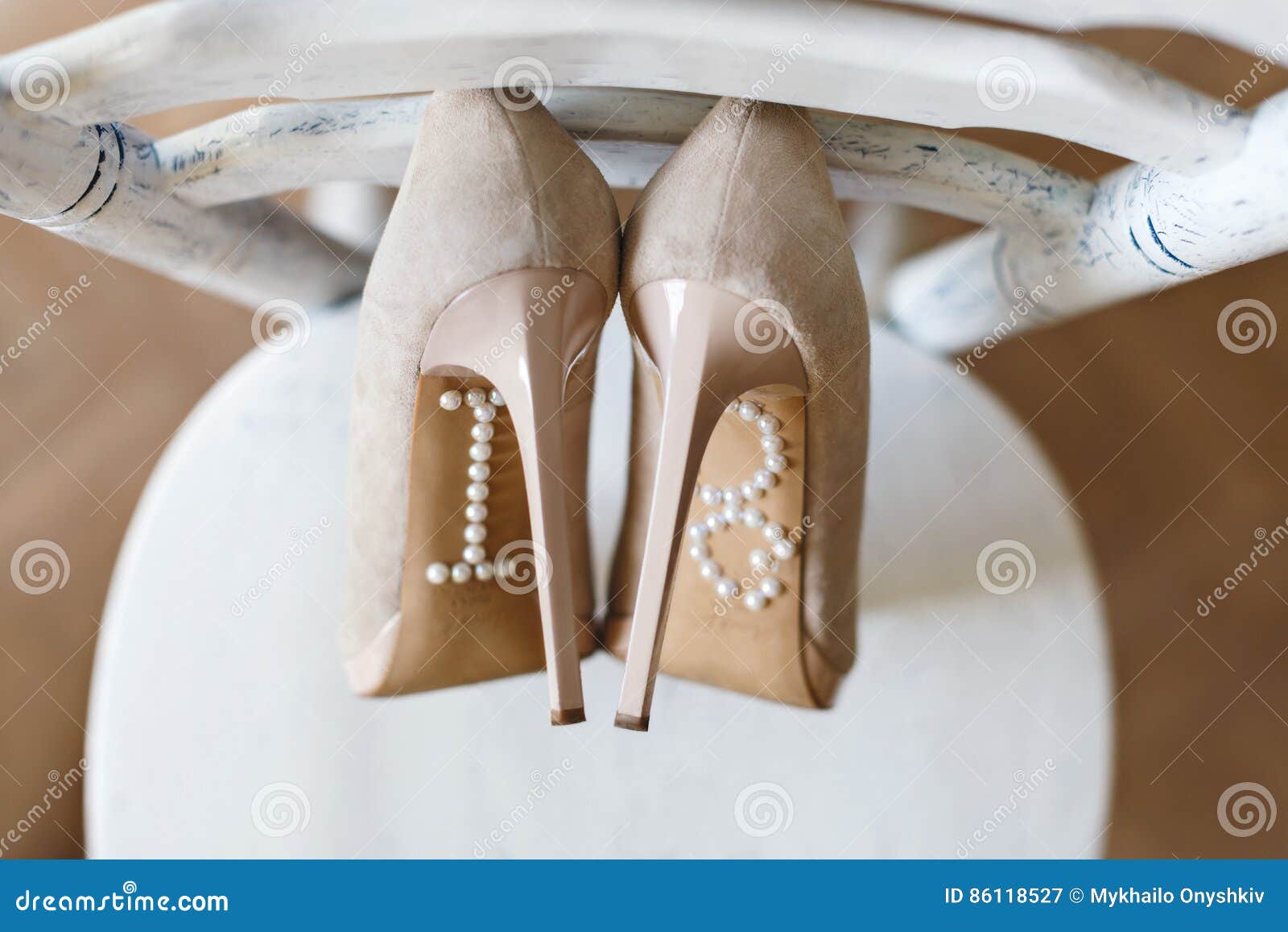 Shoes standing on chair stock image. Image of females - 86118527