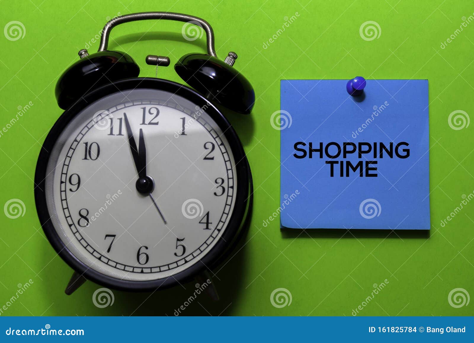 shooping time write on sticky notes.  on green table background