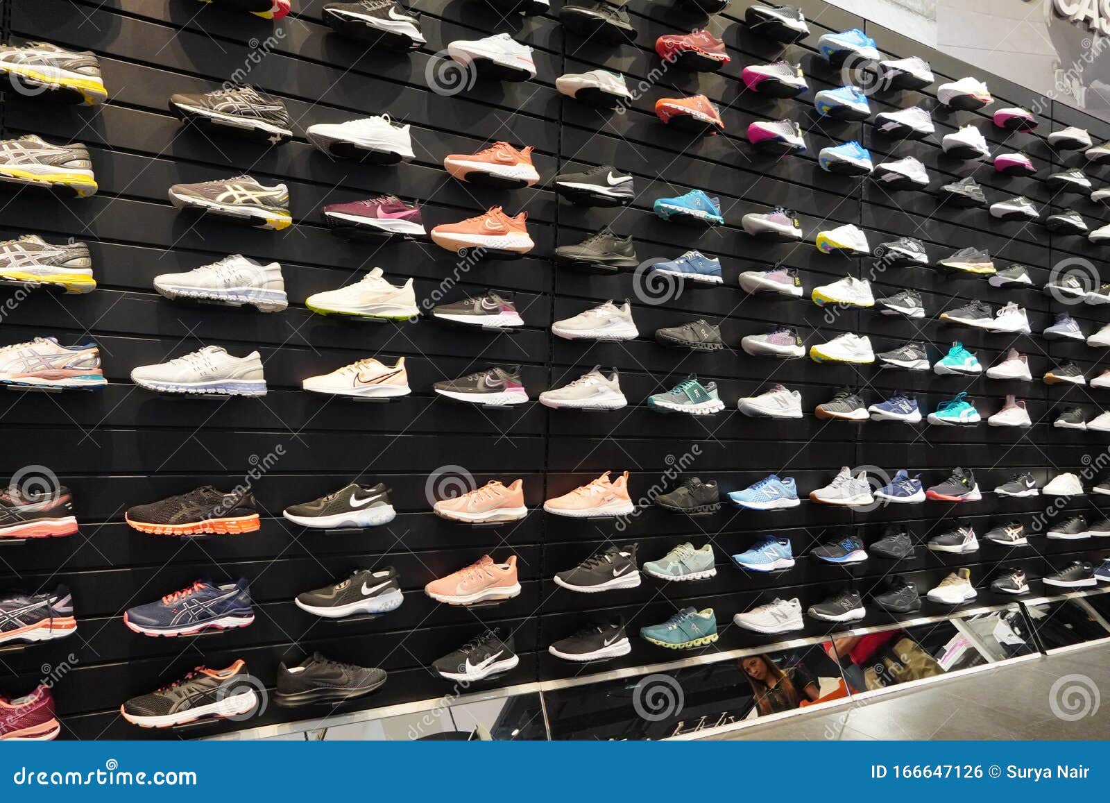 Shop Display of a Lot of Sports Shoes on a Wall. a View of a Wall of ...