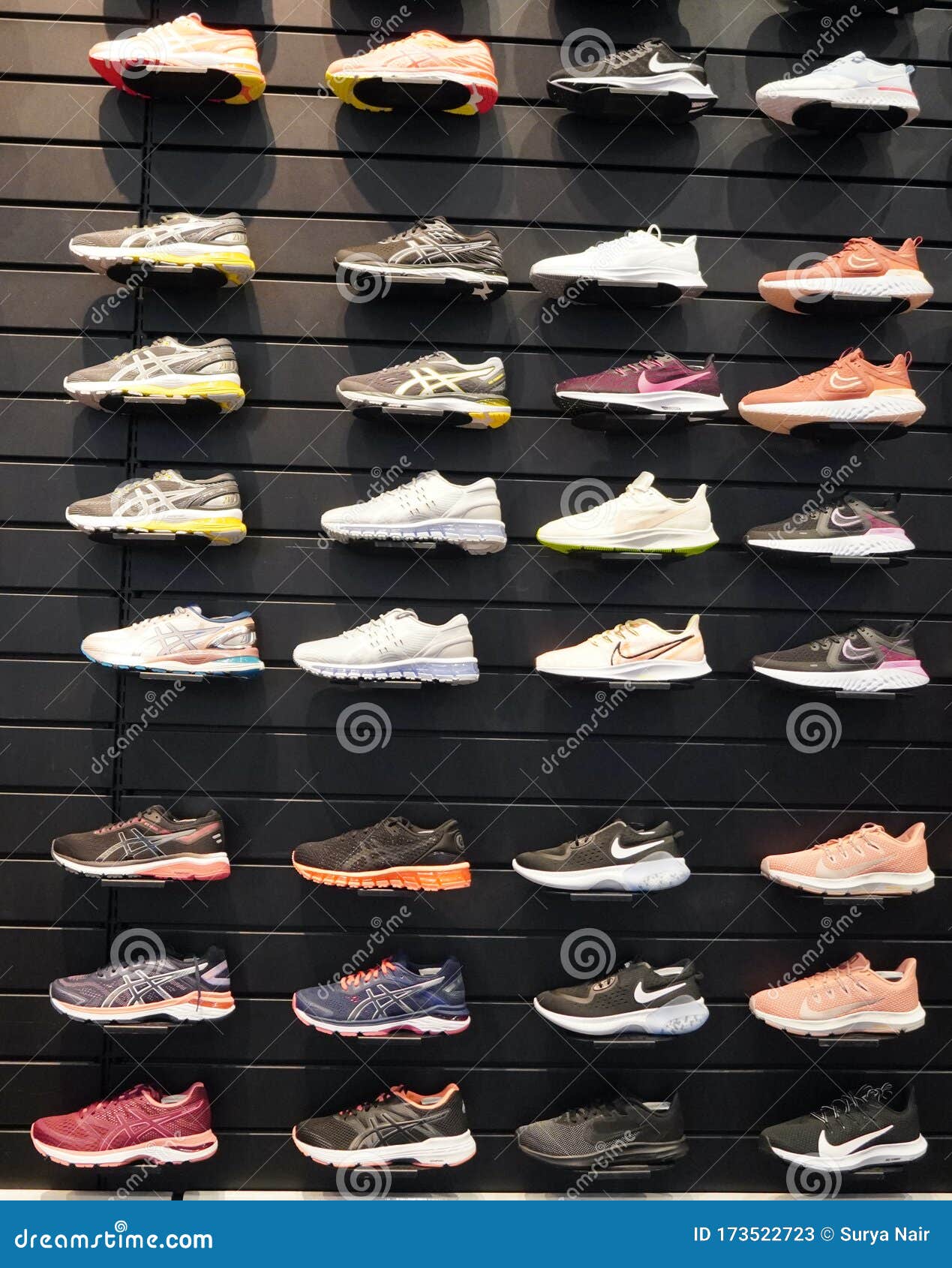 Shop Display of a Lot of Sports Shoes on a Wall. a View of a Wall of ...