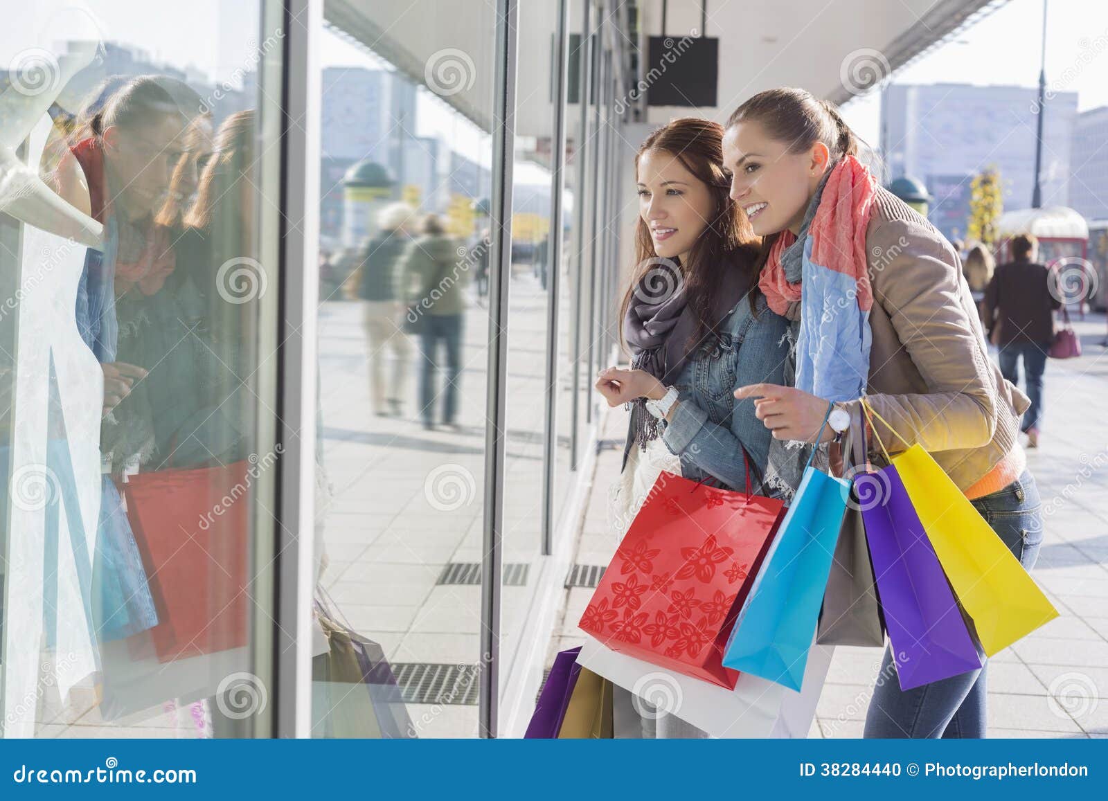 shopaholic female friends window shopping