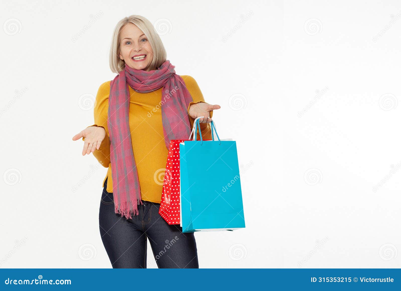 shopper. shopaholic shopping woman holding many shopping bags excited  on white.