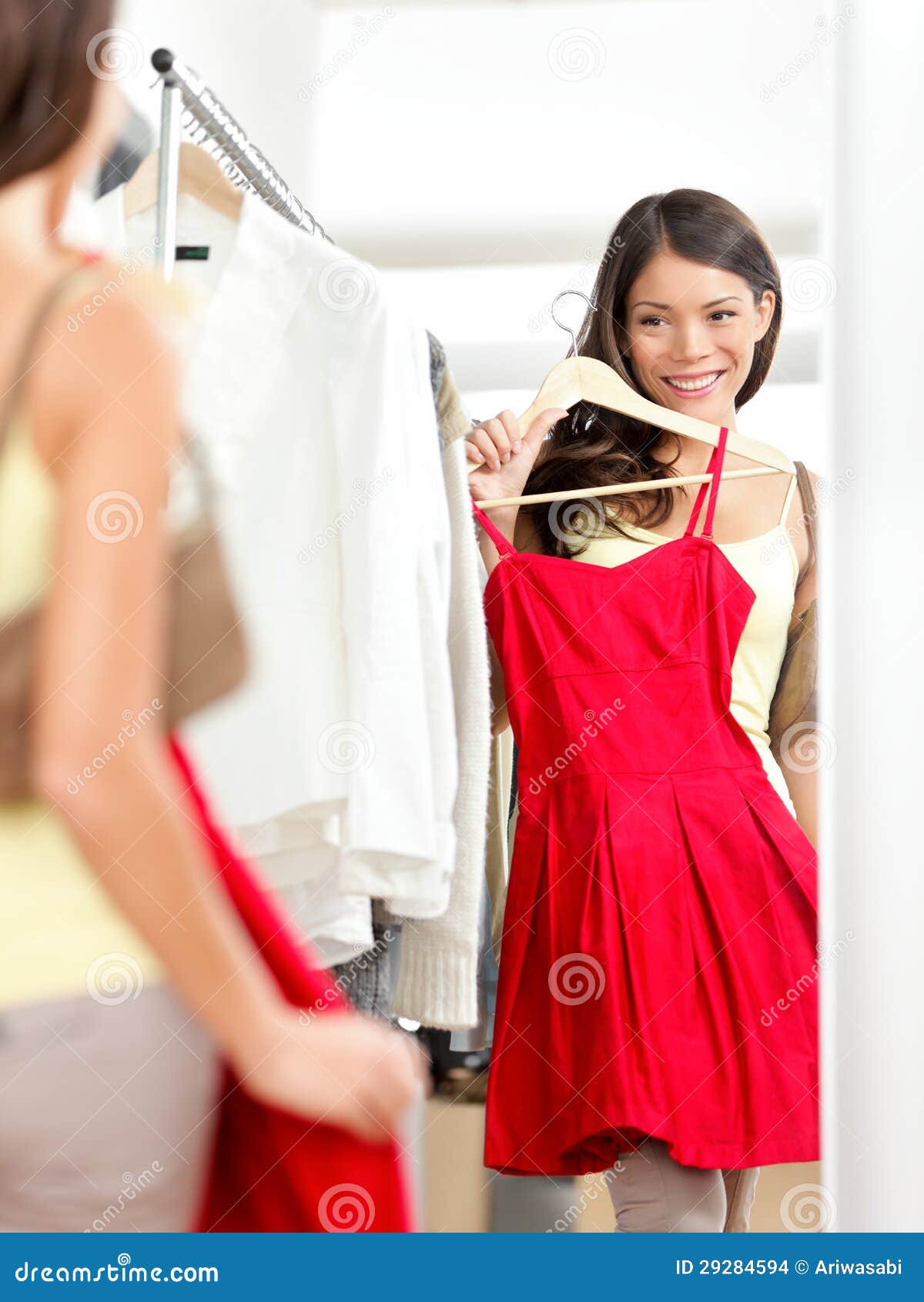 Shopper Woman Trying Clothing Dress Shopping Stock Photo