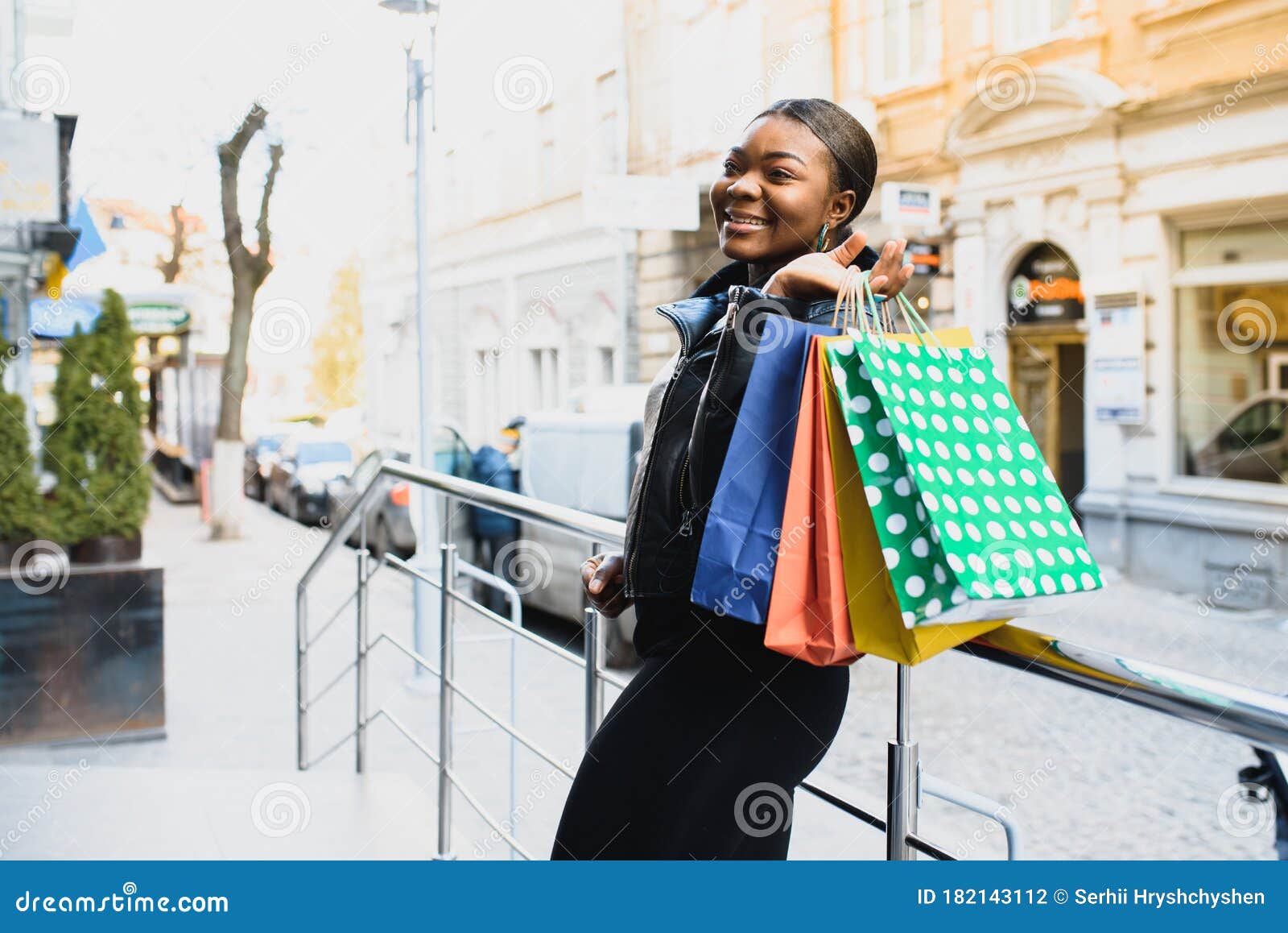 A Shopping Black Woman Carrying Shopping Bags Outdoor Stock Photo ...