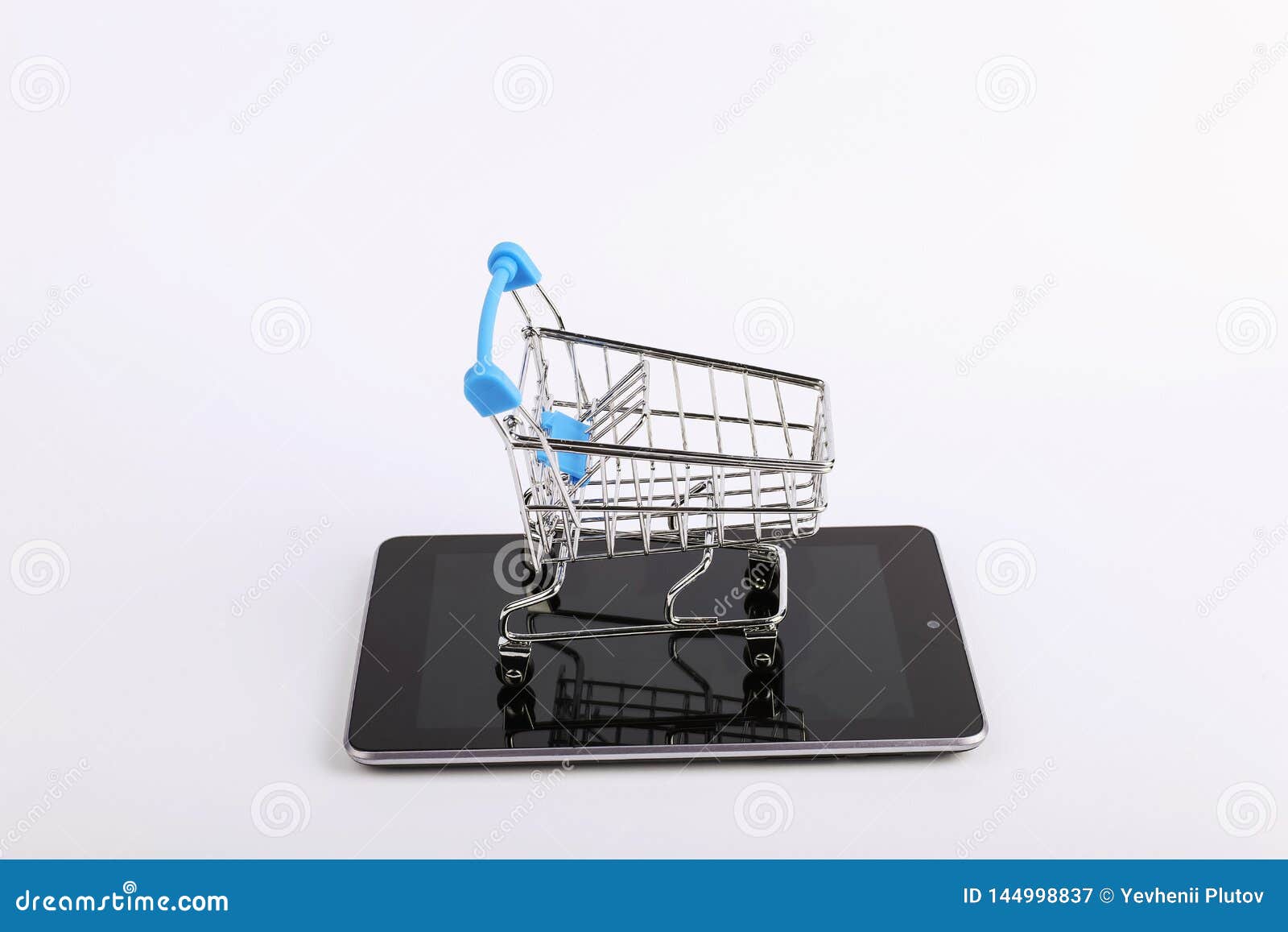 Shopping Cart Stands on the Smartphone. Online Sales Concept Stock ...