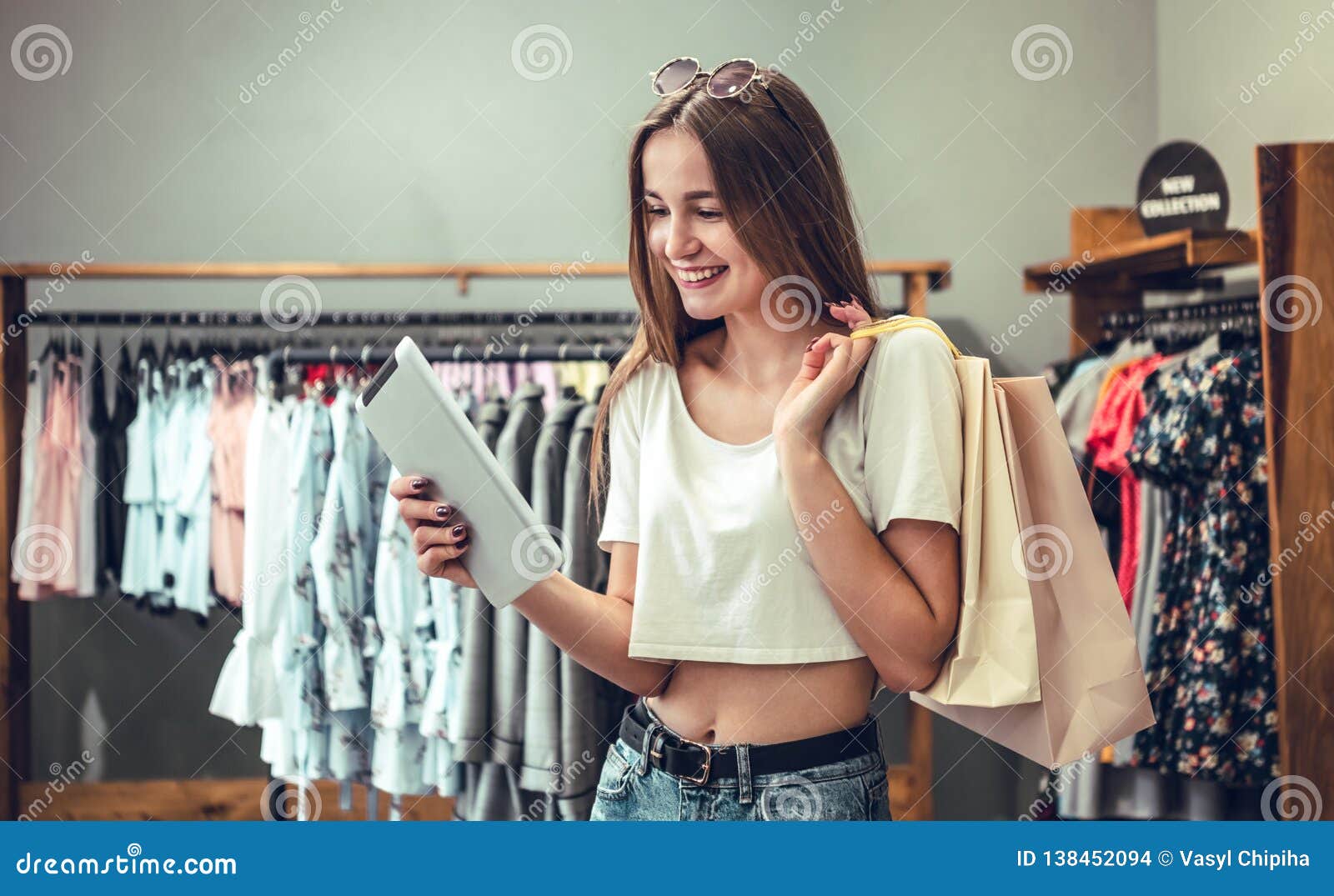 Shopping Girl with Shopping Bags. Beautiful Woman in the Store Stock ...