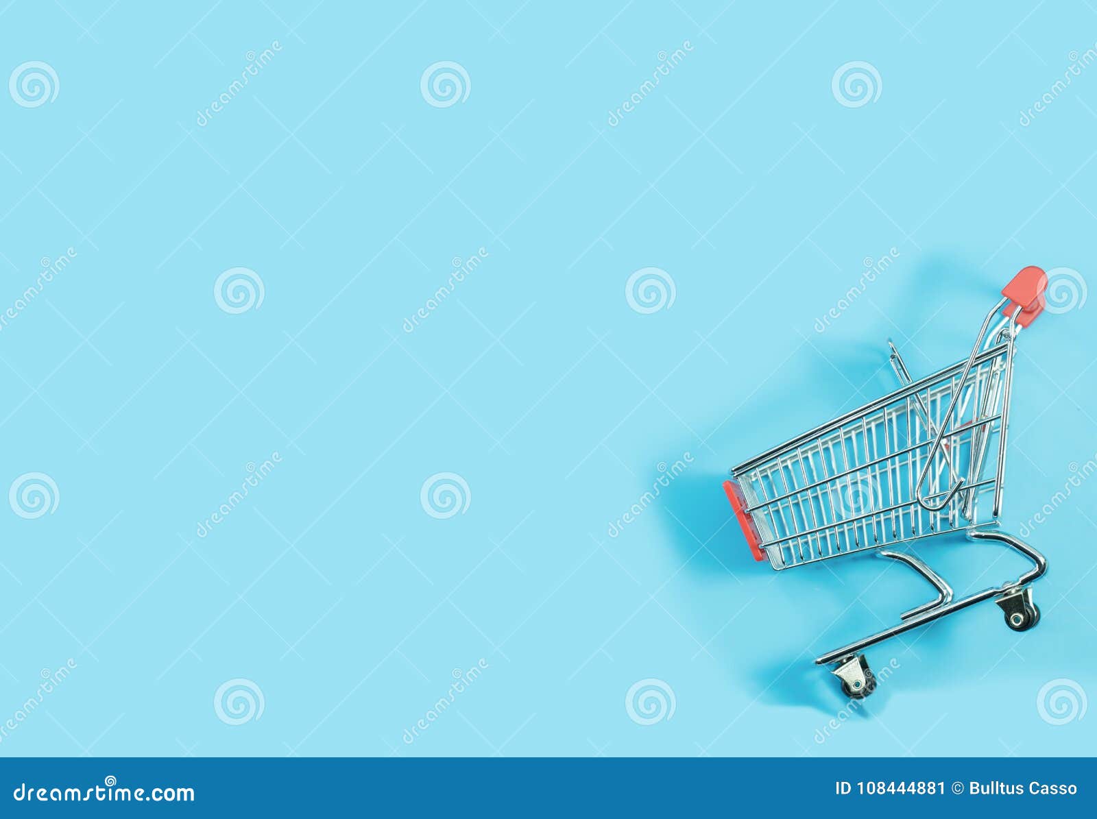 Shopping Trolley on Blue Background. Stock Image - Image of discount,  business: 108444881