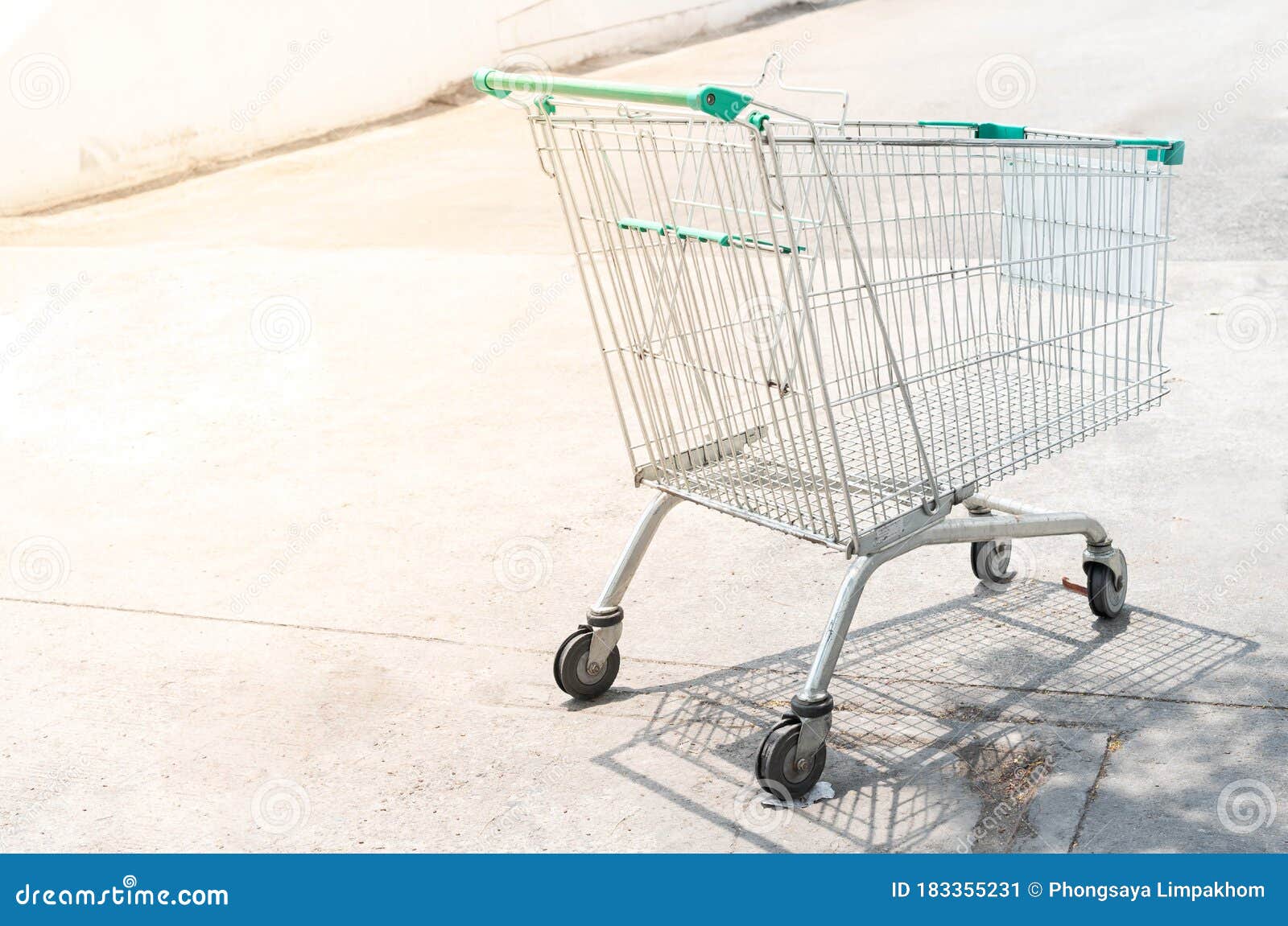 Shopping Trolleys in Supermarket Parking at the Outside of Supermarket ...