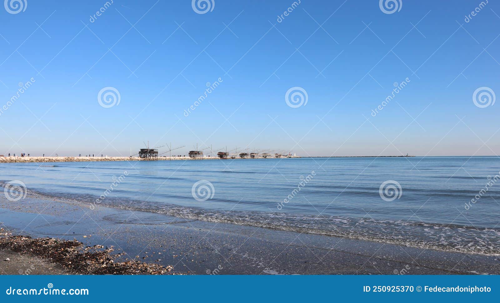 shore of the beach at low tide and the wooden houses called trab