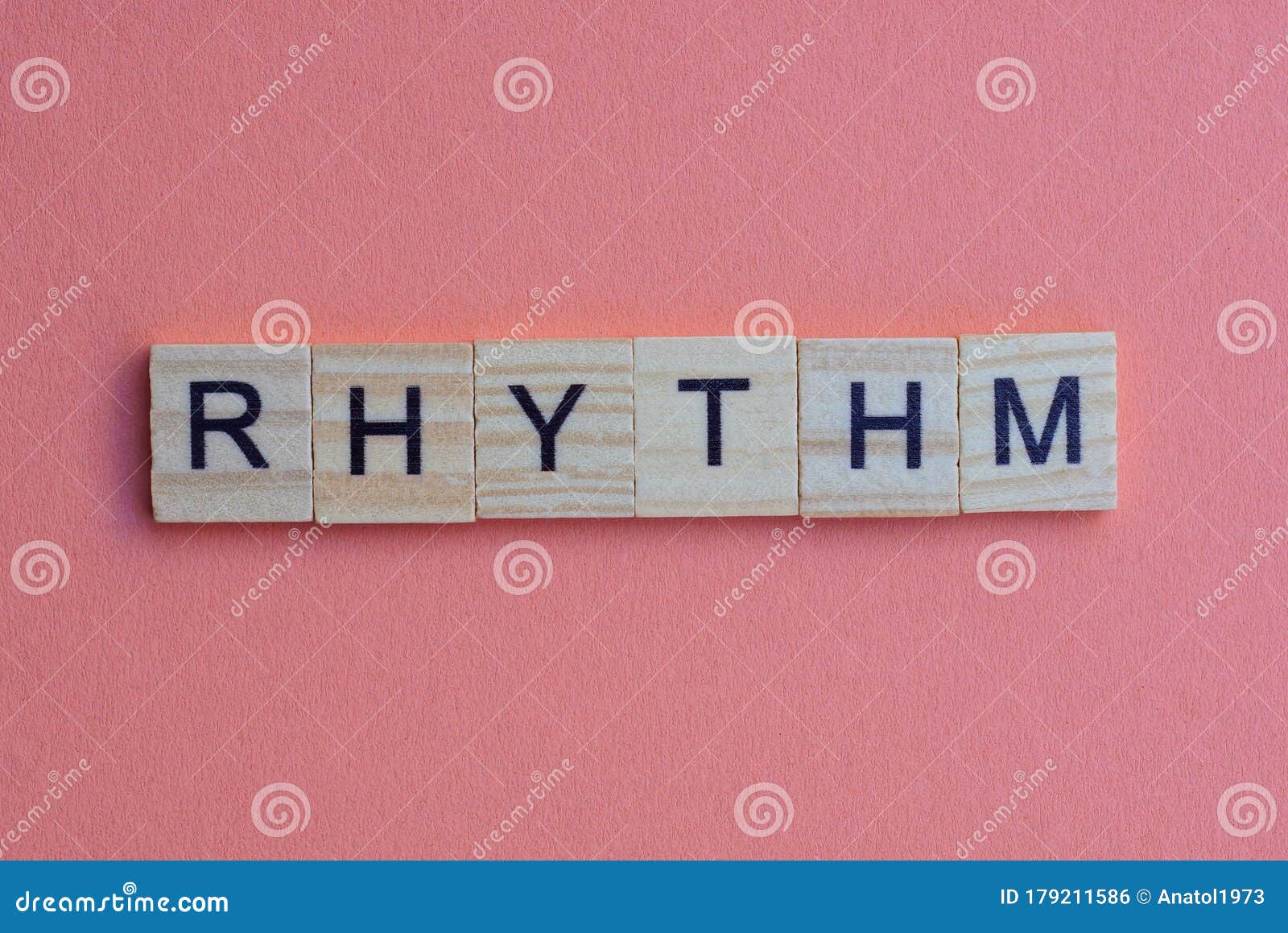short small lettering rhythm in gray wooden letters with black fon