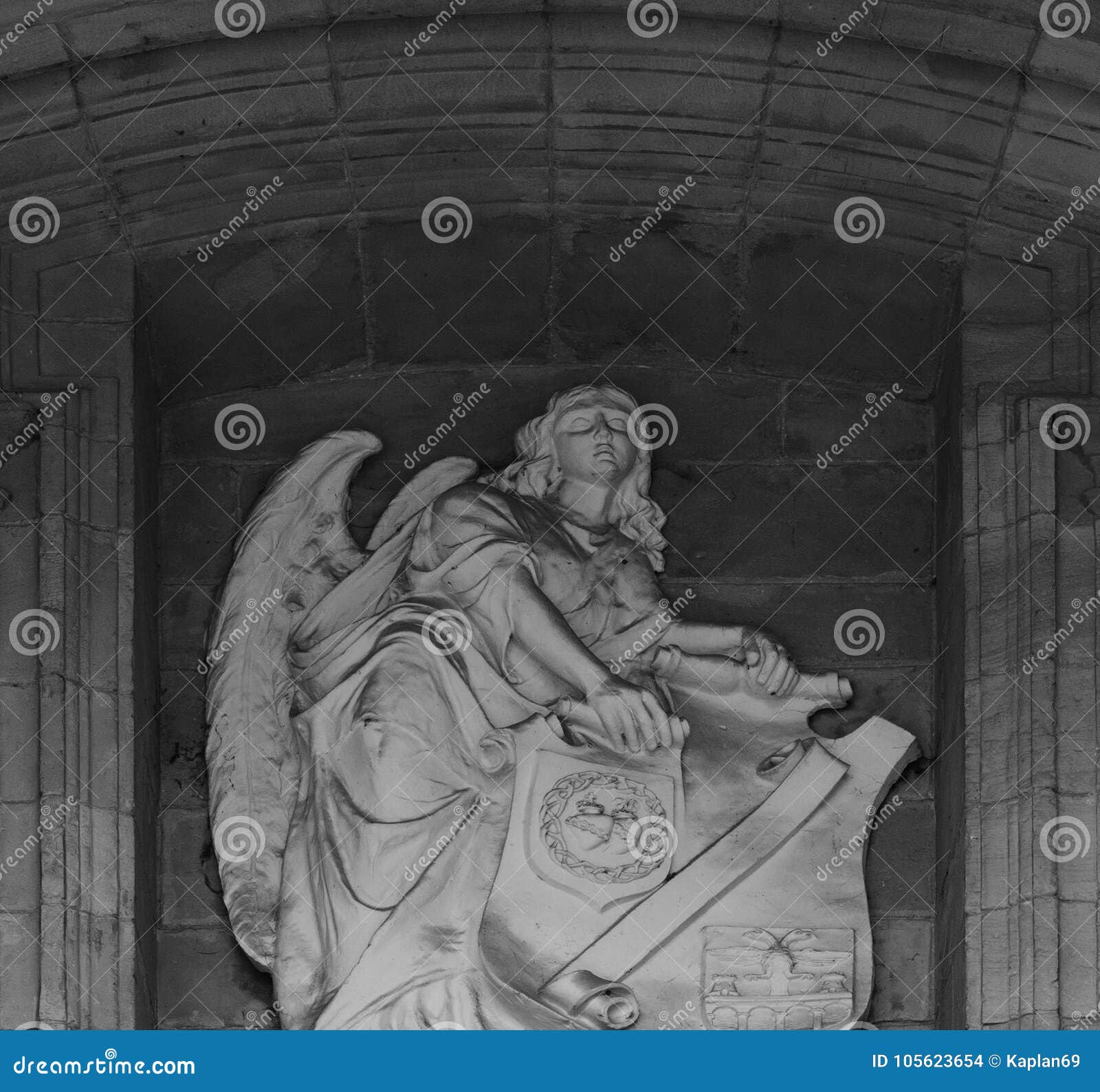 giant angel holding the shield